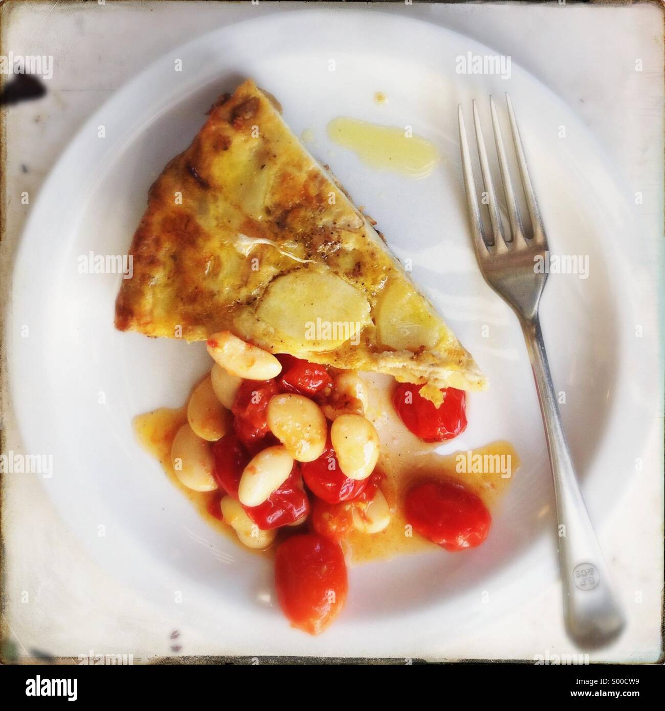 Spanish Tortilla With Tomato & Butter Bean Salad Stock Photo Alamy