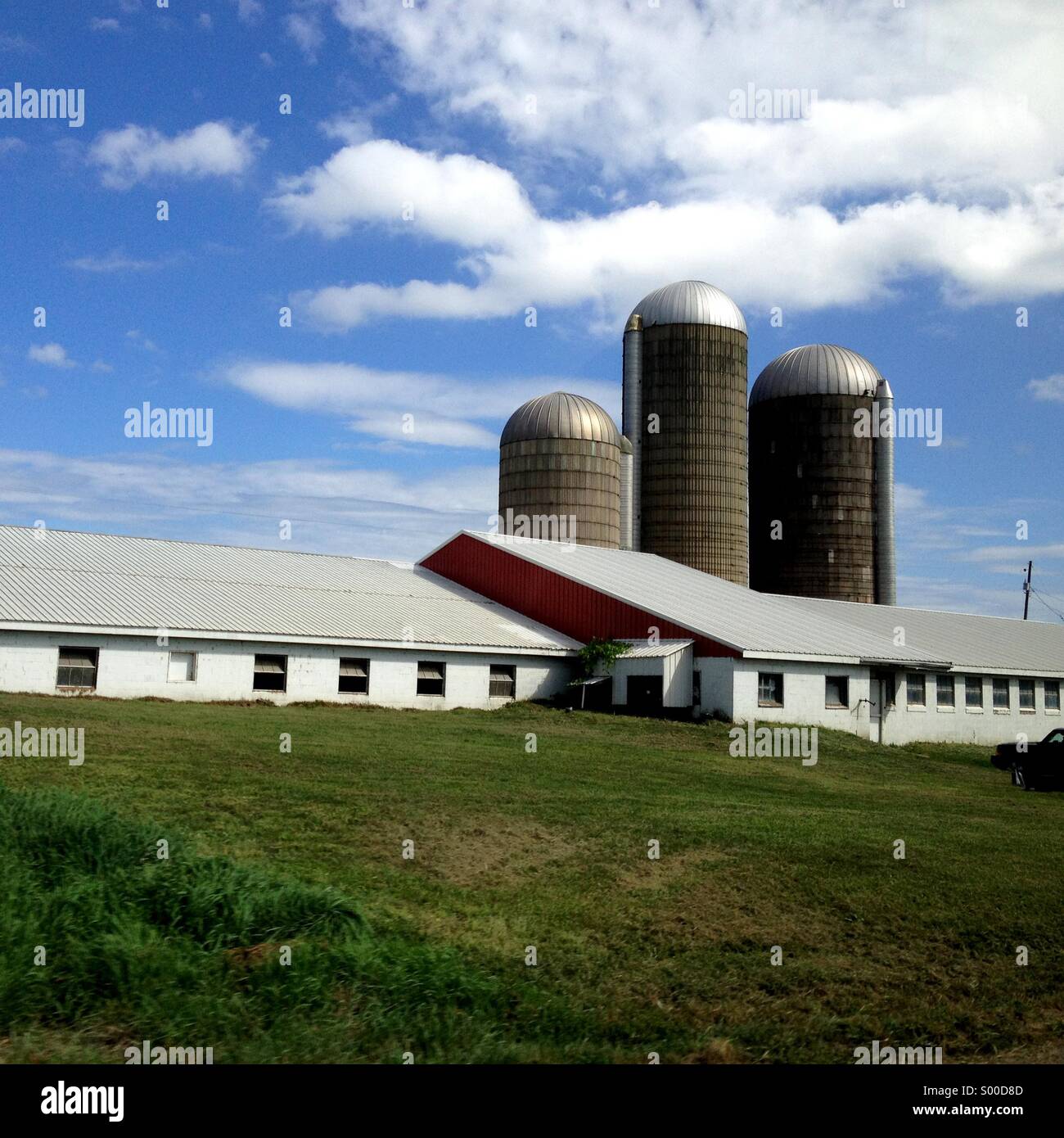 Farm buildings on a sunny summer day Stock Photo