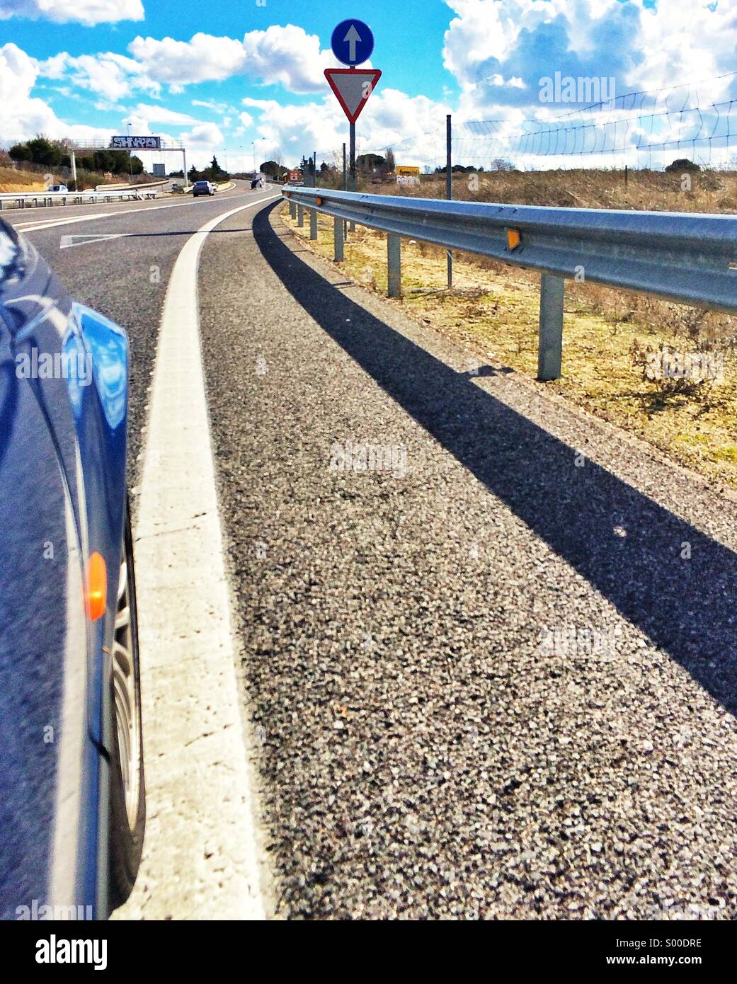 Car going road hi-res stock photography and images - Alamy