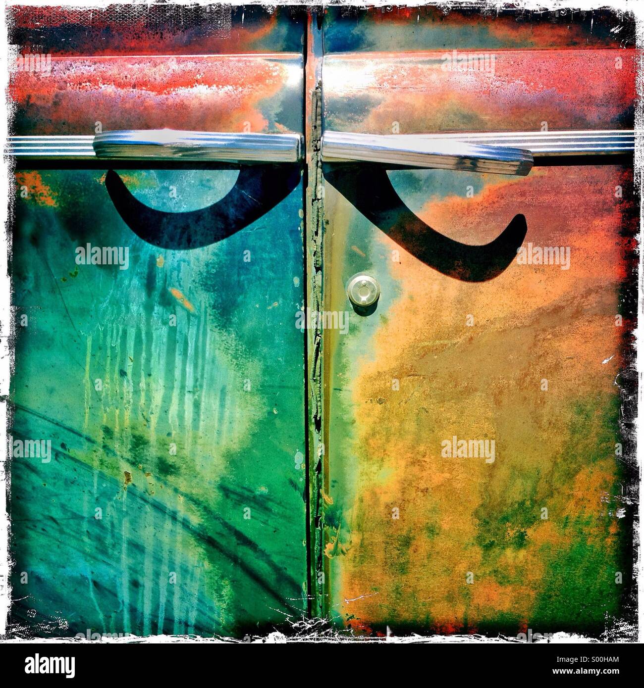 Shadow on door of old rusted car looks like handlebar mustache - Smartphone Captured Stock Image