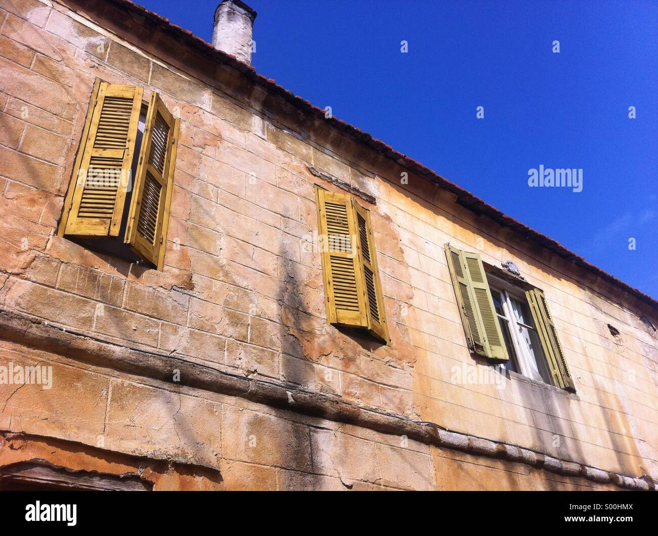 Old yellow building in Greece Stock Photo Alamy