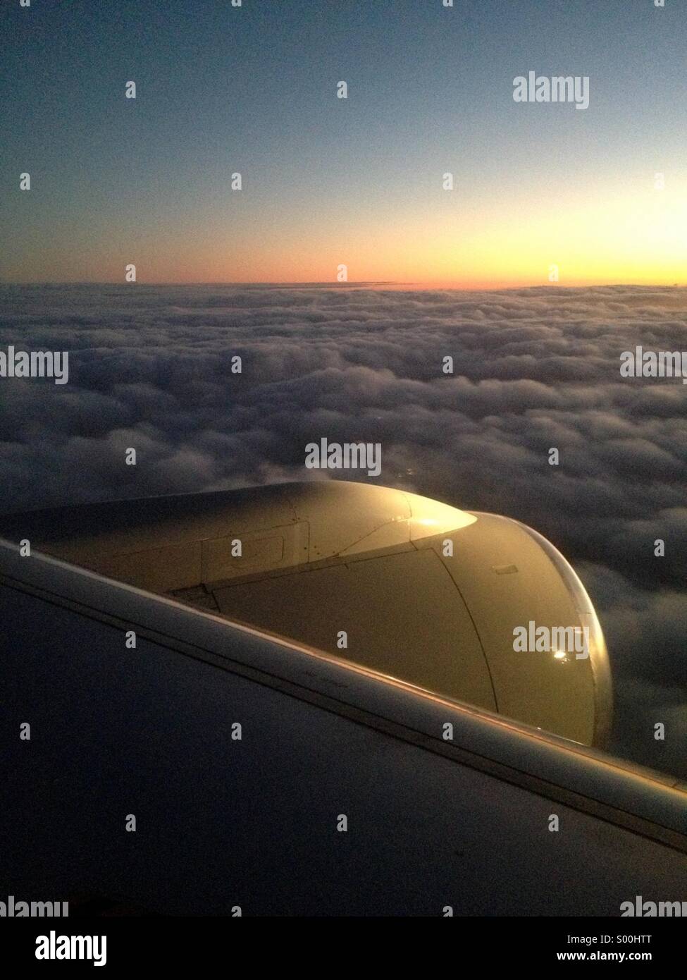 Window seat dawn and jet engine - Smartphone Captured Stock Image