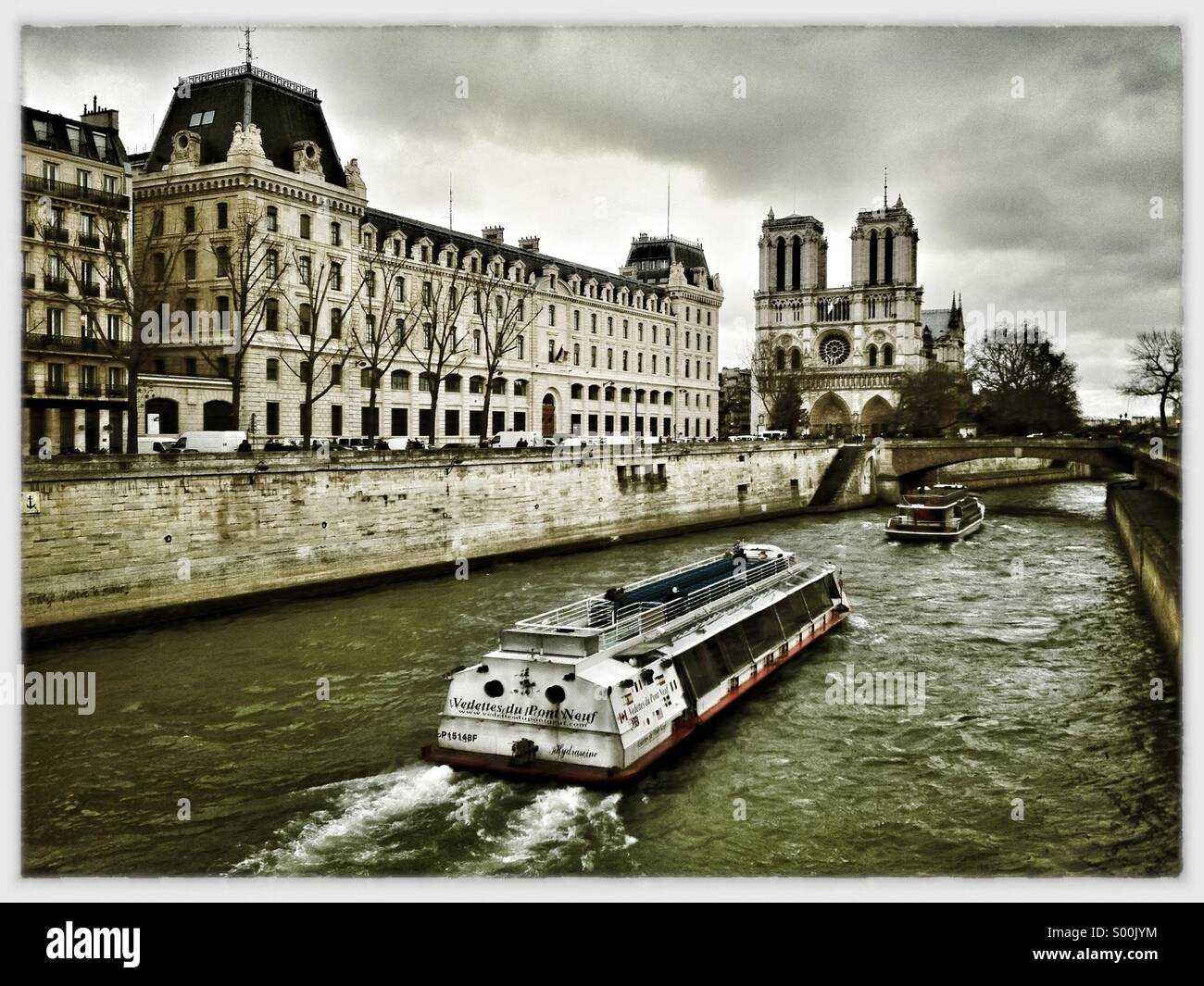 River Seine and Notre Dame, Paris, France on a cloudy winter day. - Smartphone Captured Stock Image