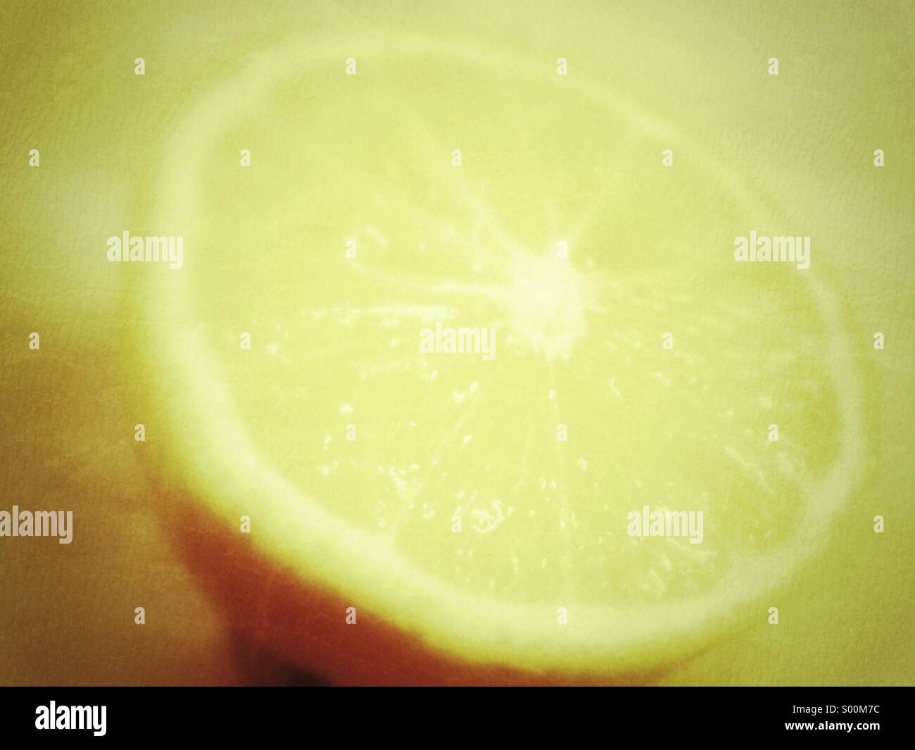 Soft focus close up of sliced lemon. - Smartphone Captured Stock Image