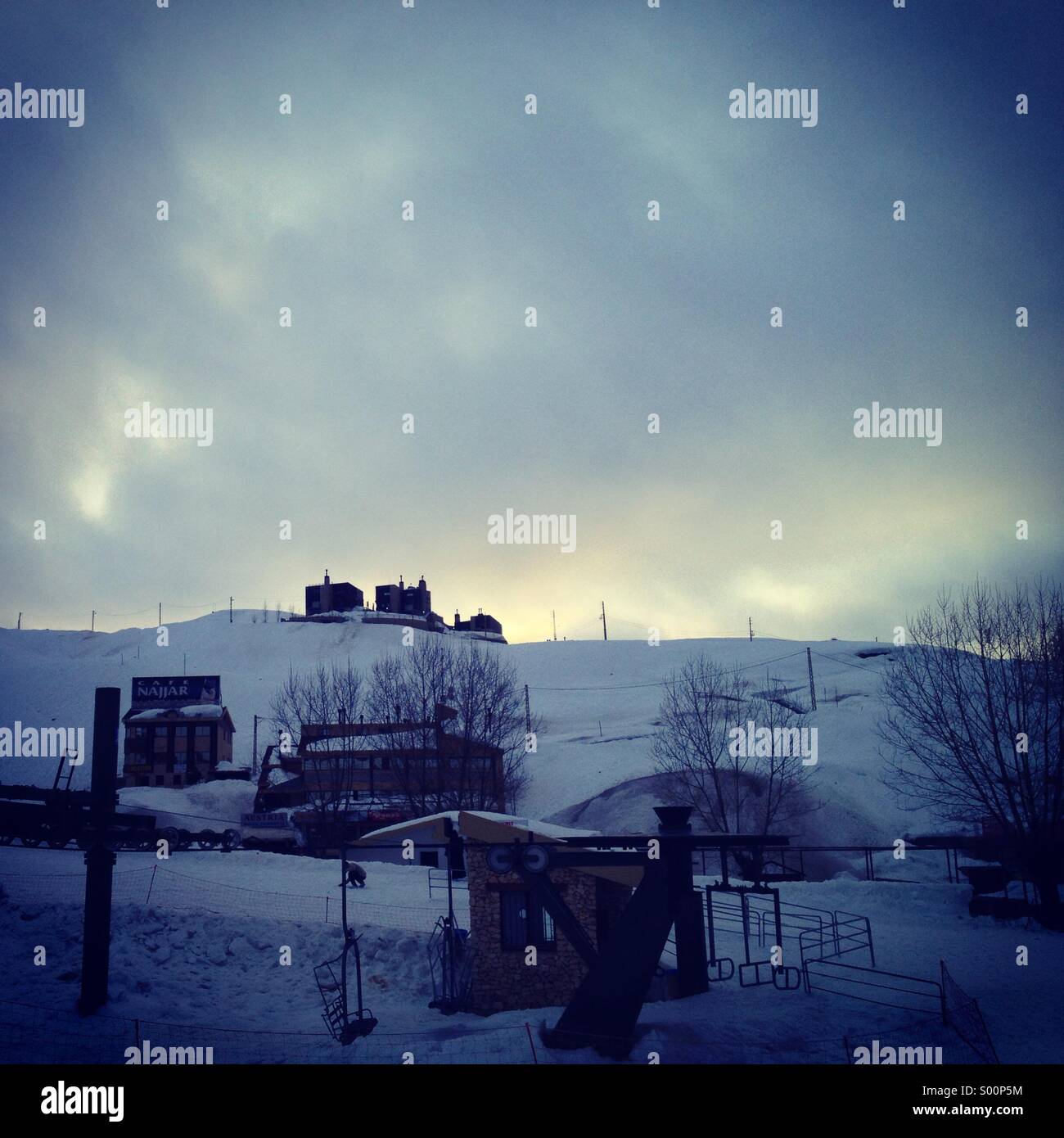 Sunset behind the snowy  mountains in winter - Lebanon - Middle East - Smartphone Captured Stock Image