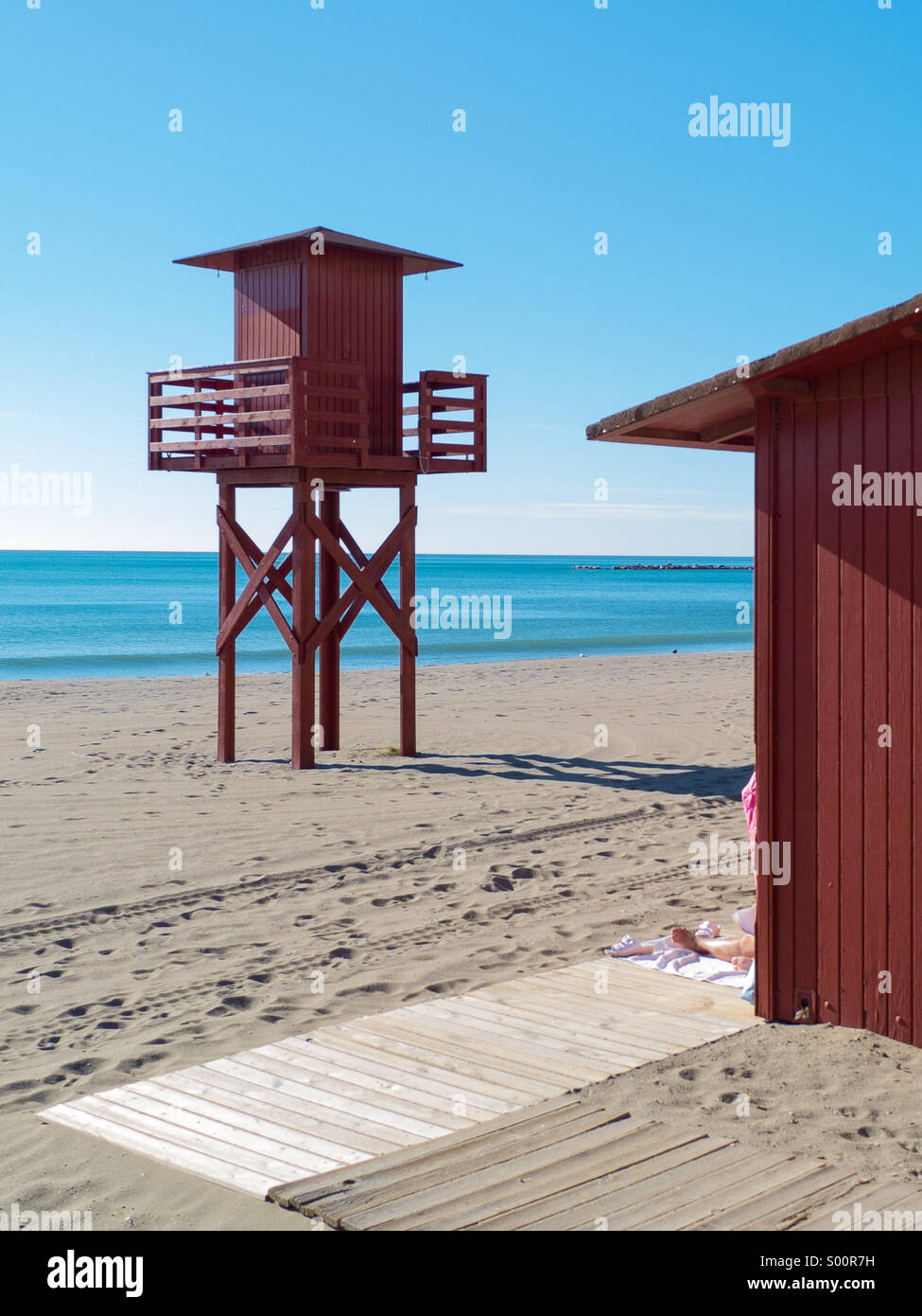 Life guard station on the empty beach in Malaga in Spain - Smartphone Captured Stock Image