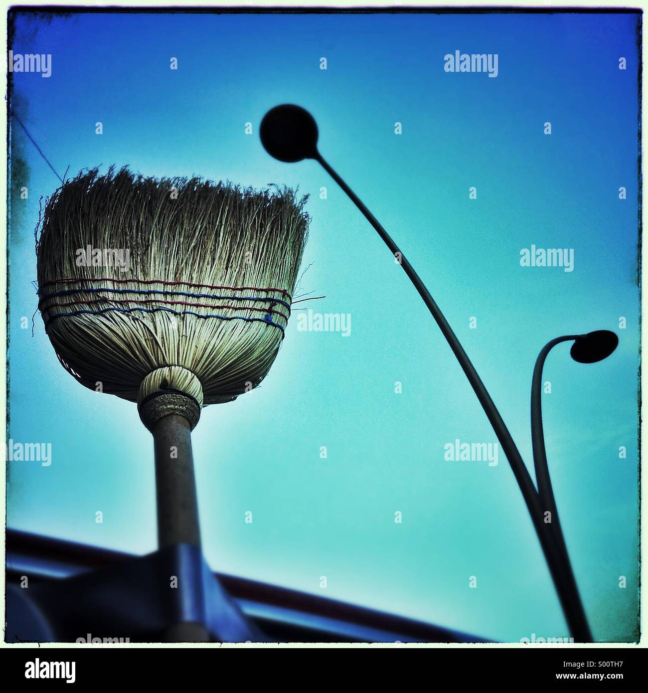 Broom and lamps posts Stock Photo