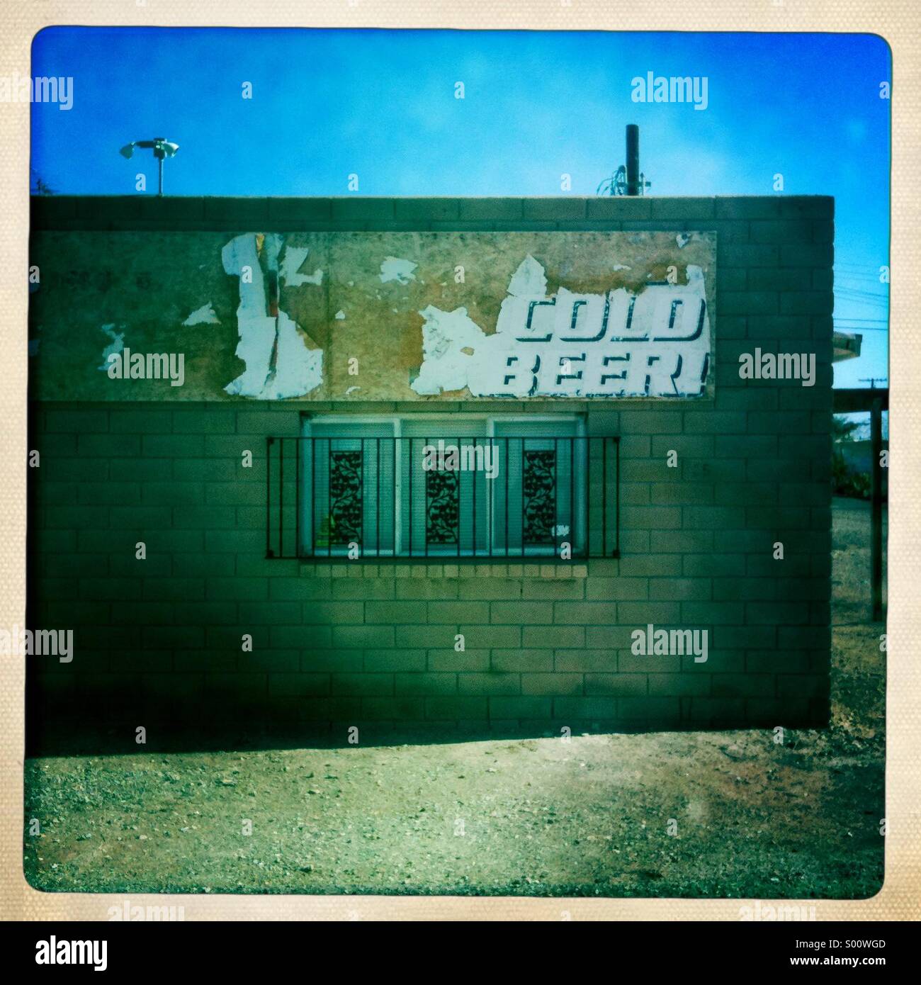 Cold Beer sign on exterior of building, Bombay Beach, Salton Sea, Calif. Stock Photo