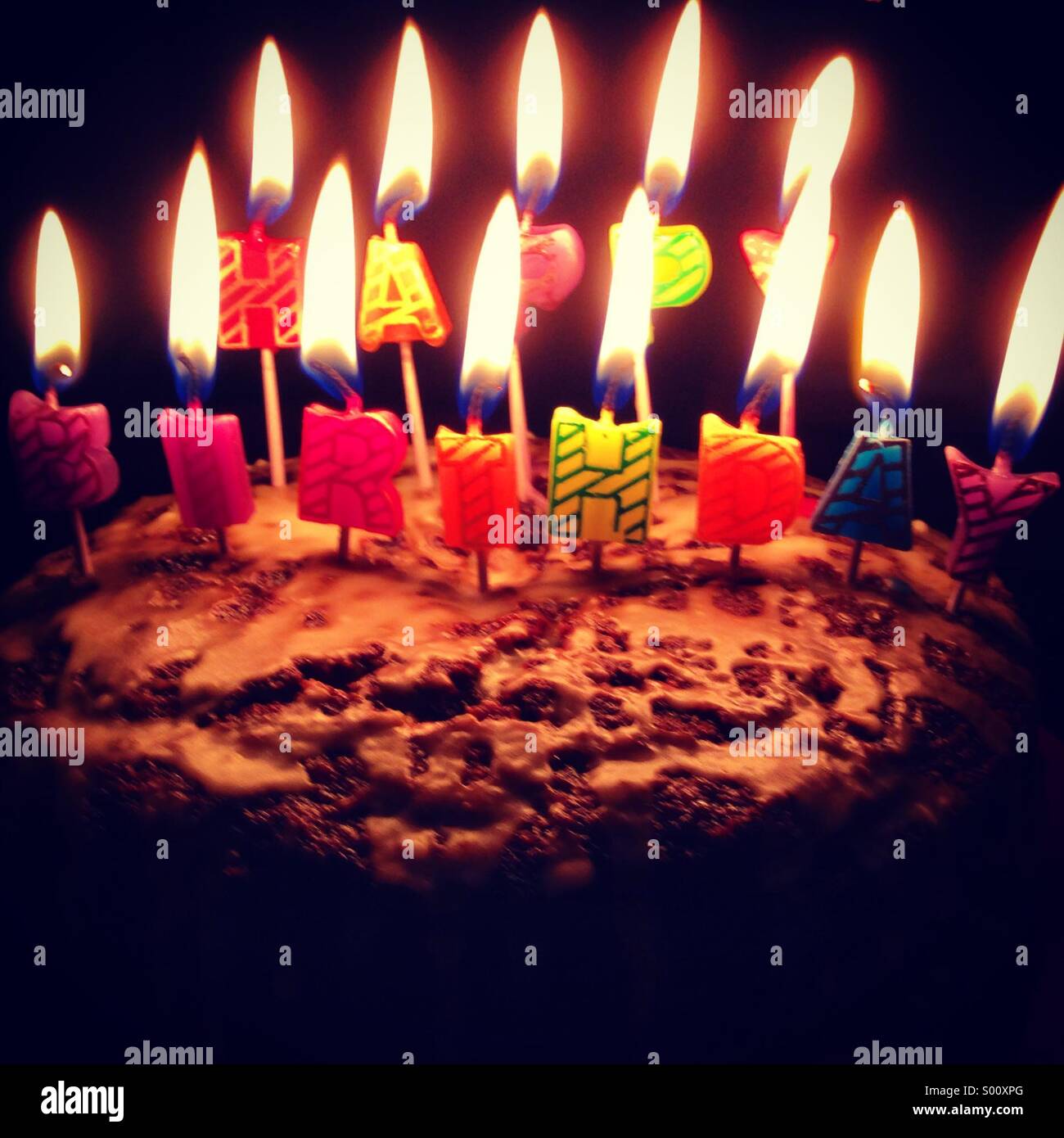 Happy birthday candles on a cake Stock Photo Alamy