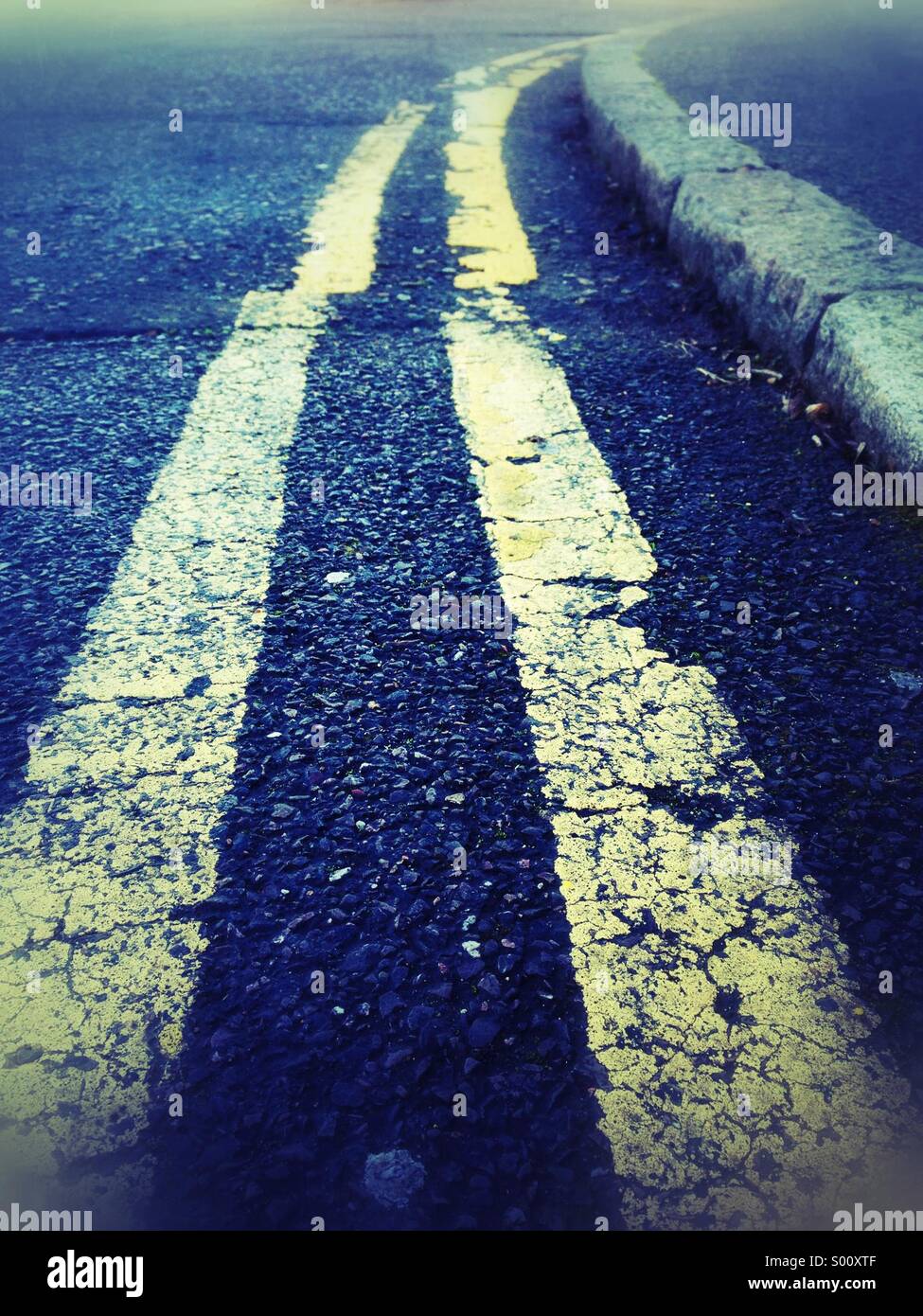 Double yellow lines - Smartphone Captured Stock Image