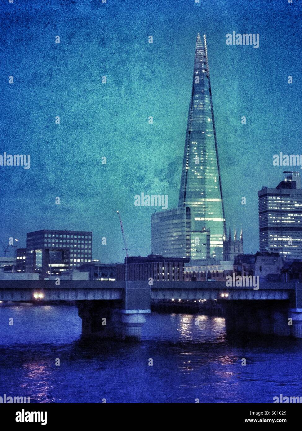 The Shard, River Thames and Cannon Street rail bridge, at night, London, UK - Smartphone Captured Stock Image