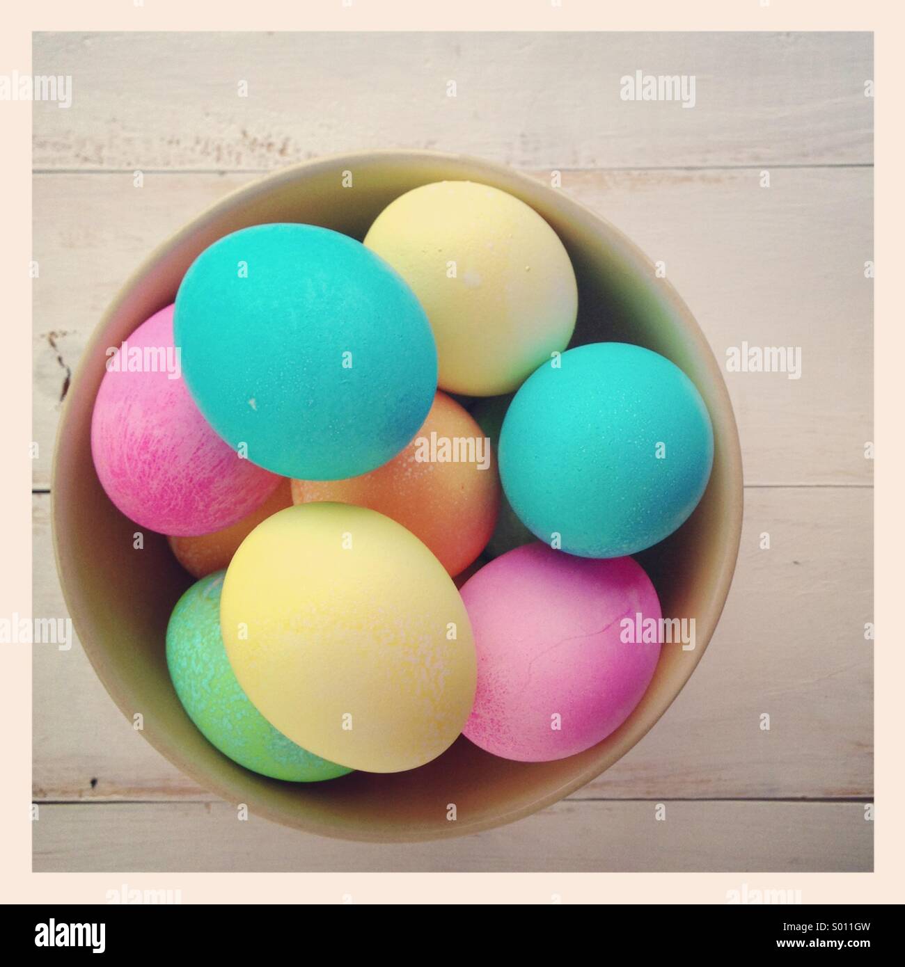 Dyed Easter eggs in a bowl Stock Photo