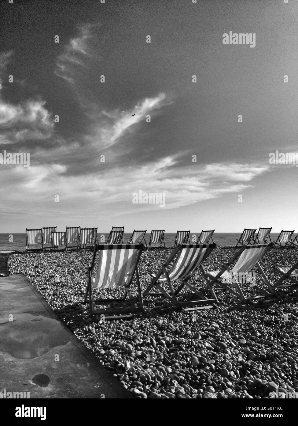 Deck chairs on a beach Stock Photo Alamy