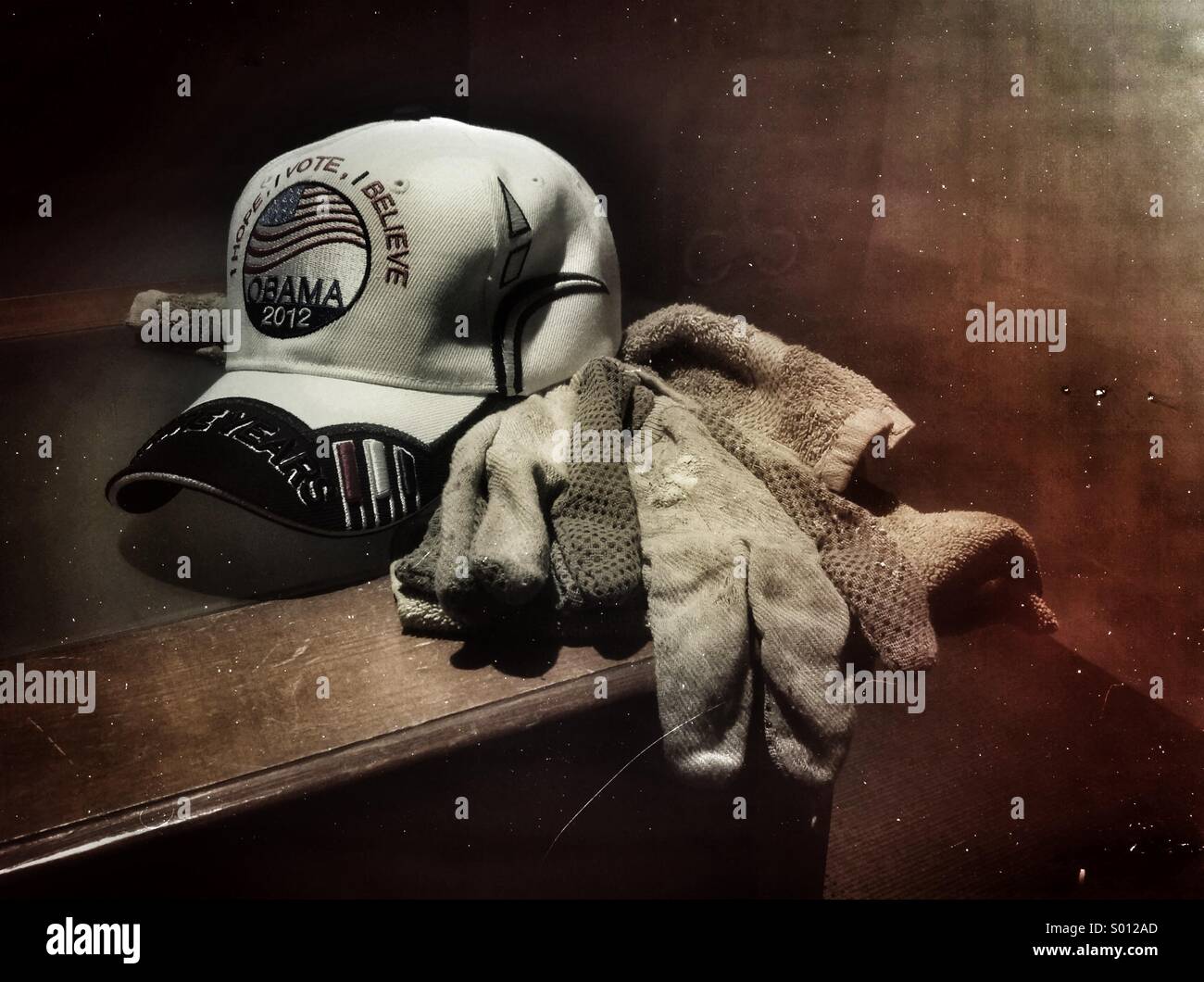 Obama hat next to work gloves. - Smartphone Captured Stock Image