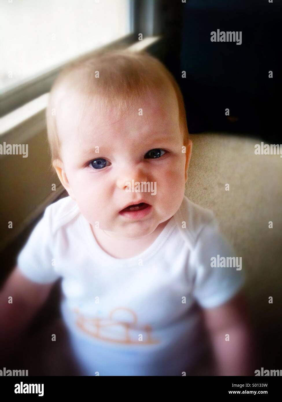 Baby with attitude Stock Photo Alamy