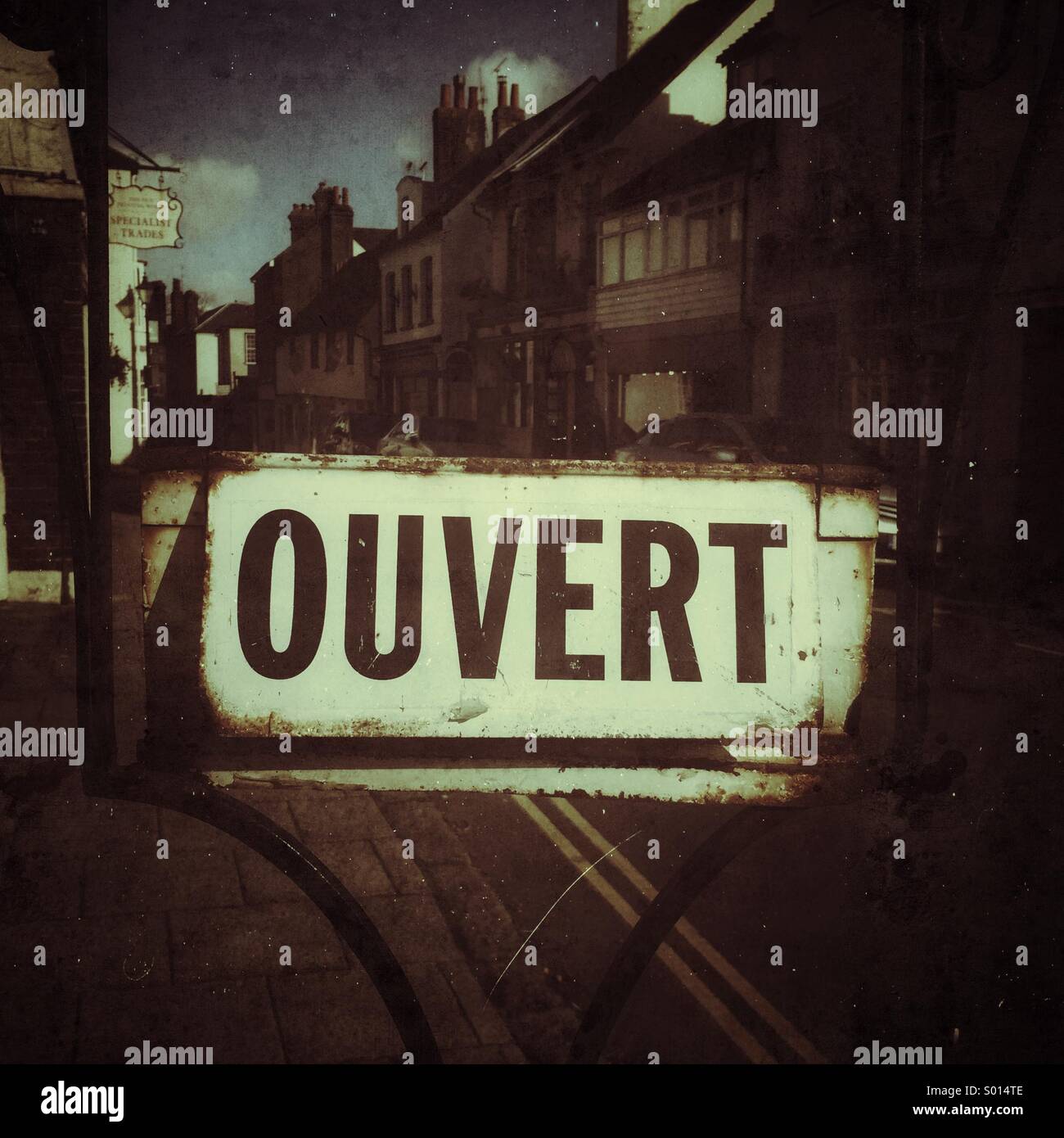 Sign at the entrance of a restaurant saying in French - Ouvert - meaning in  English - Open Stock Photo - Alamy