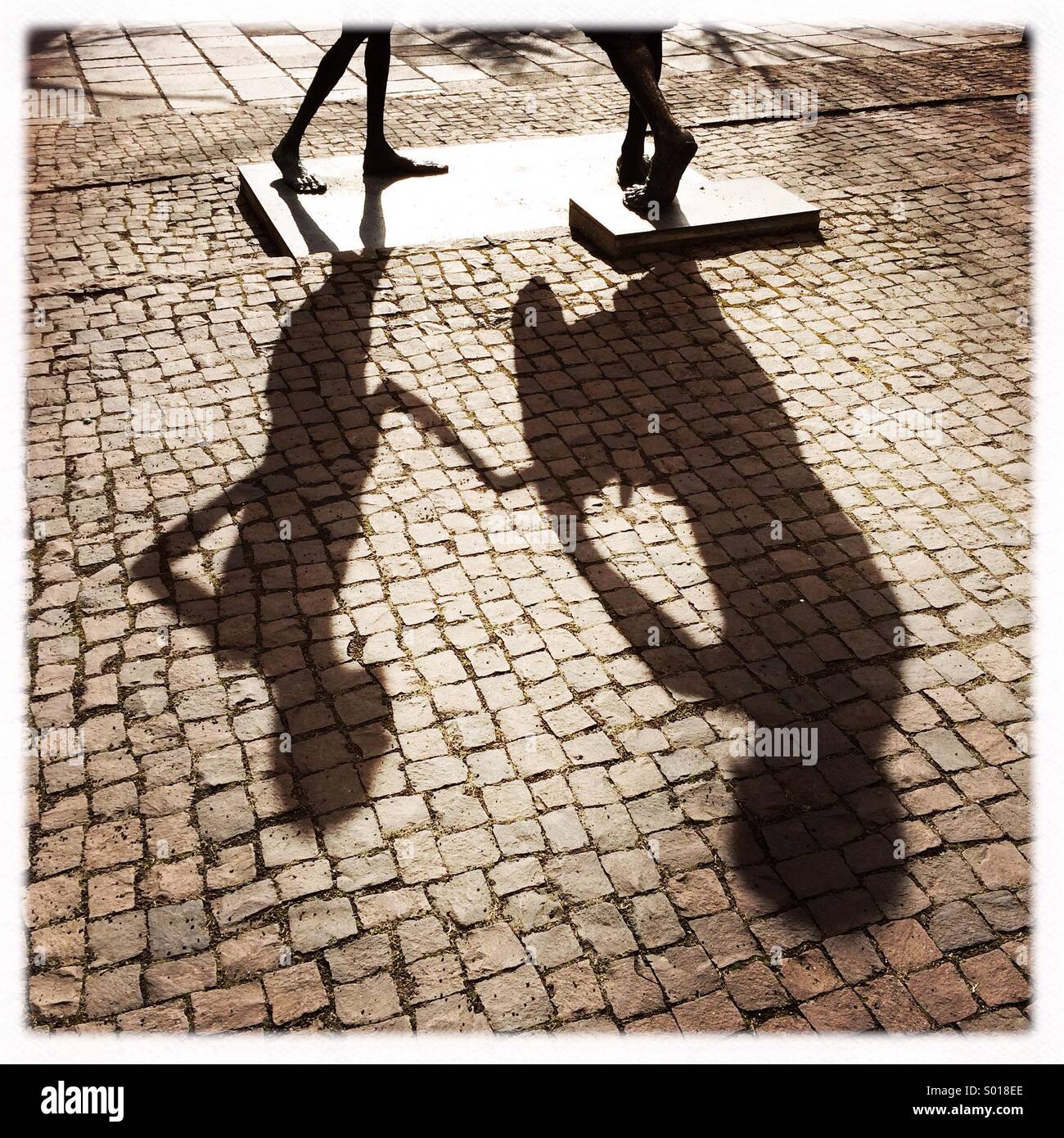 Shadow of a statue in Sindelfingen Germany Stock Photo