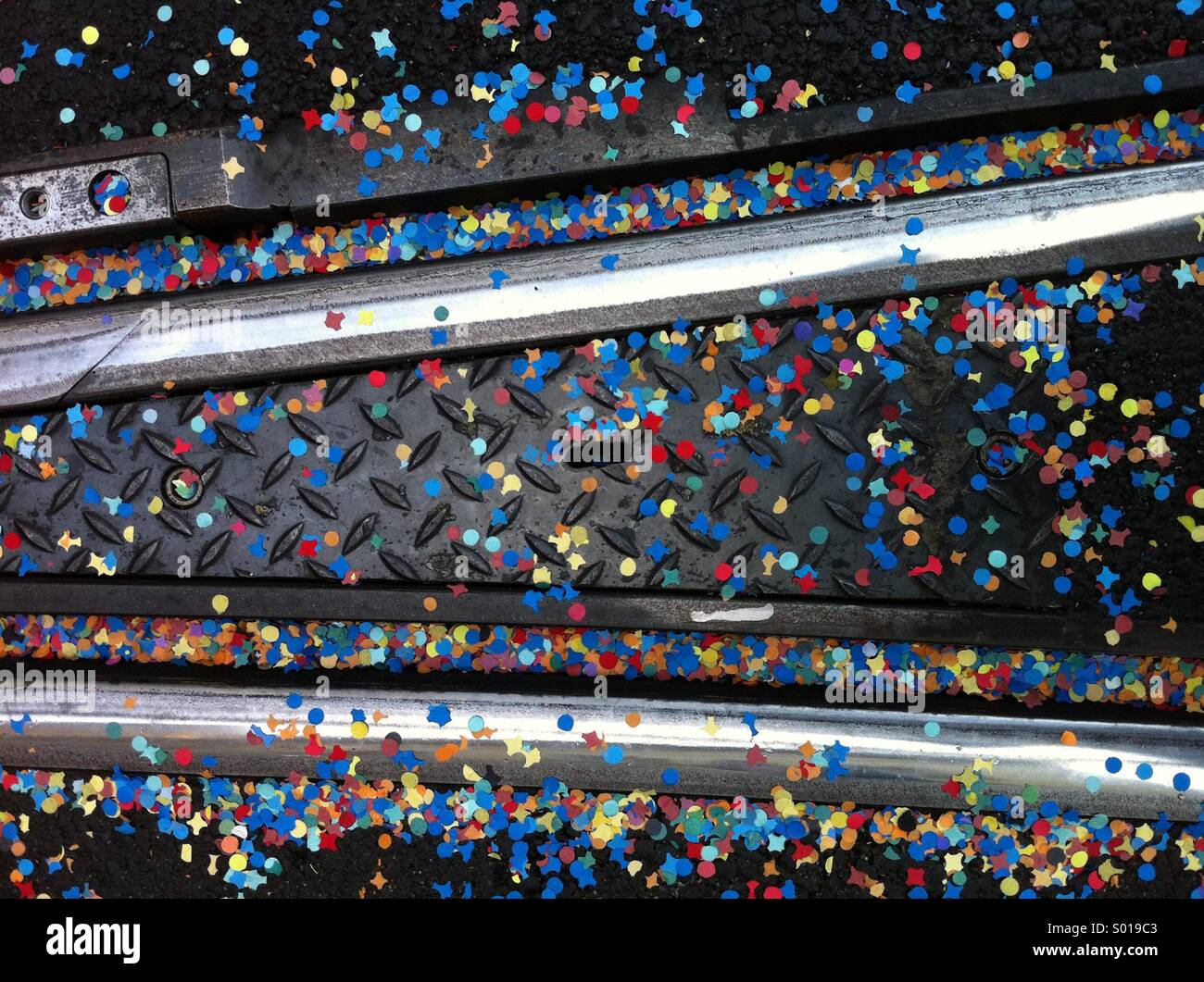 Confetti on tram tracks - Aftermath of carnival in Berne, Switzerland - Smartphone Captured Stock Image
