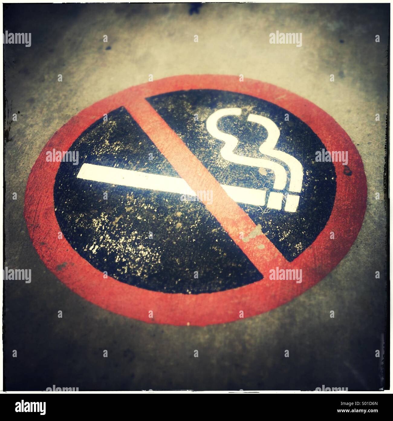 No smoking sign on pavement - Smartphone Captured Stock Image