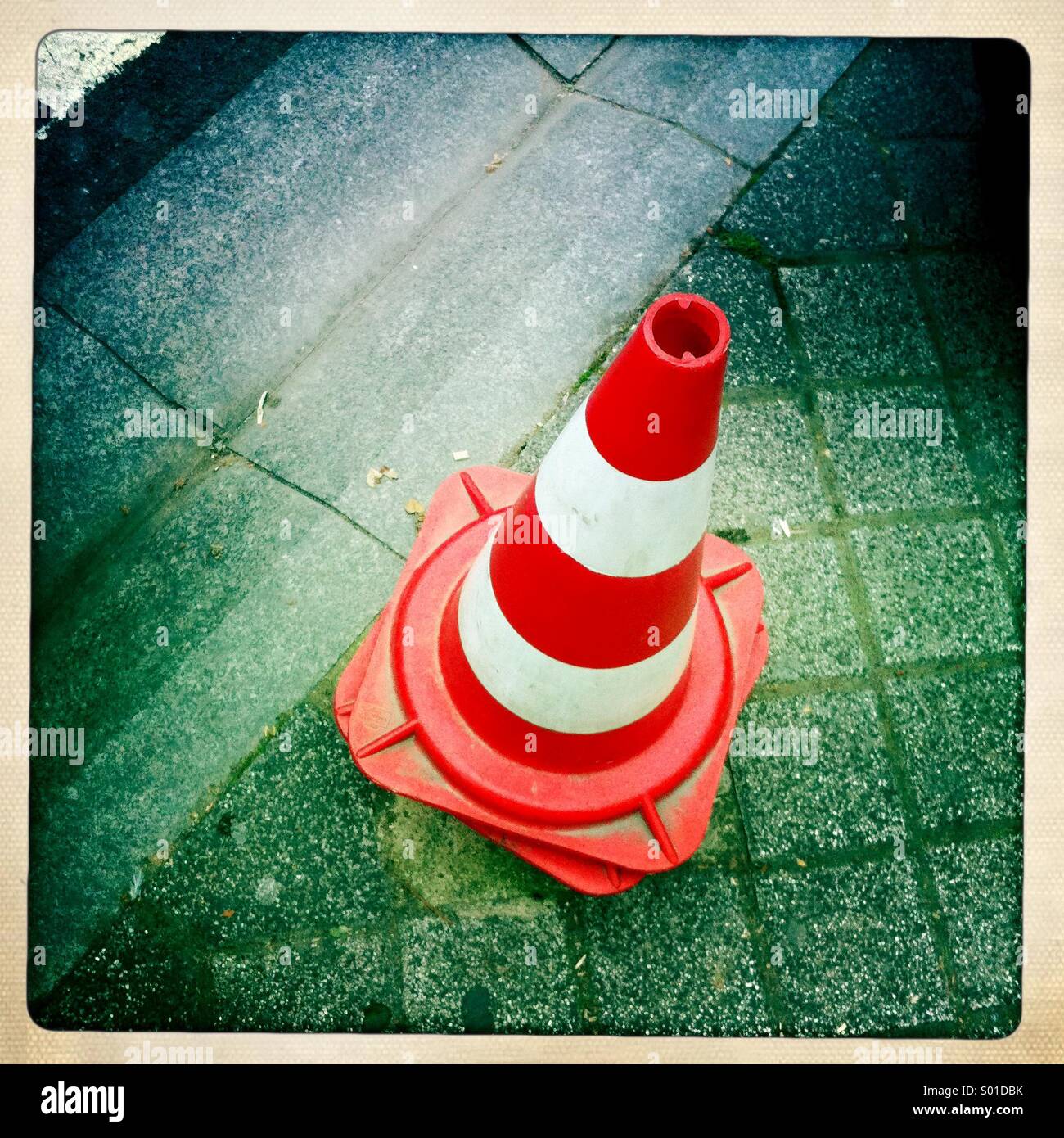 Traffic Cone on pavement Stock Photo