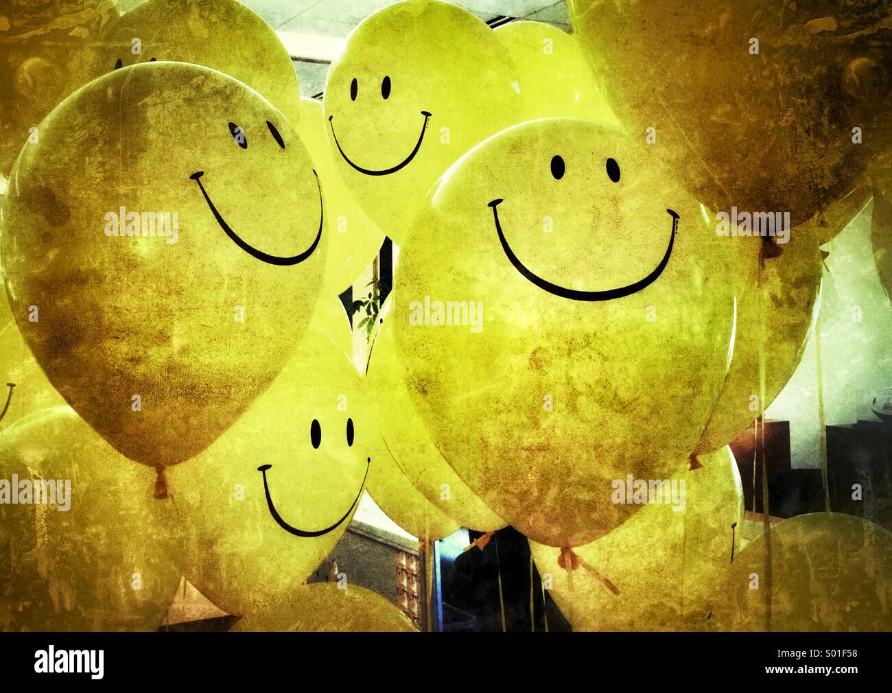 Happy face balloons Stock Photo - Alamy