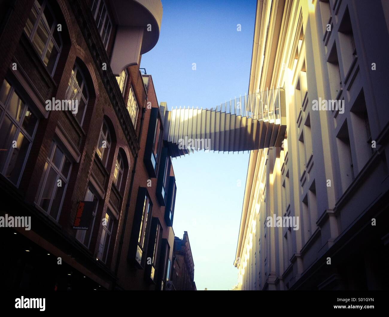 Modern architecture walkway over street - Smartphone Captured Stock Image