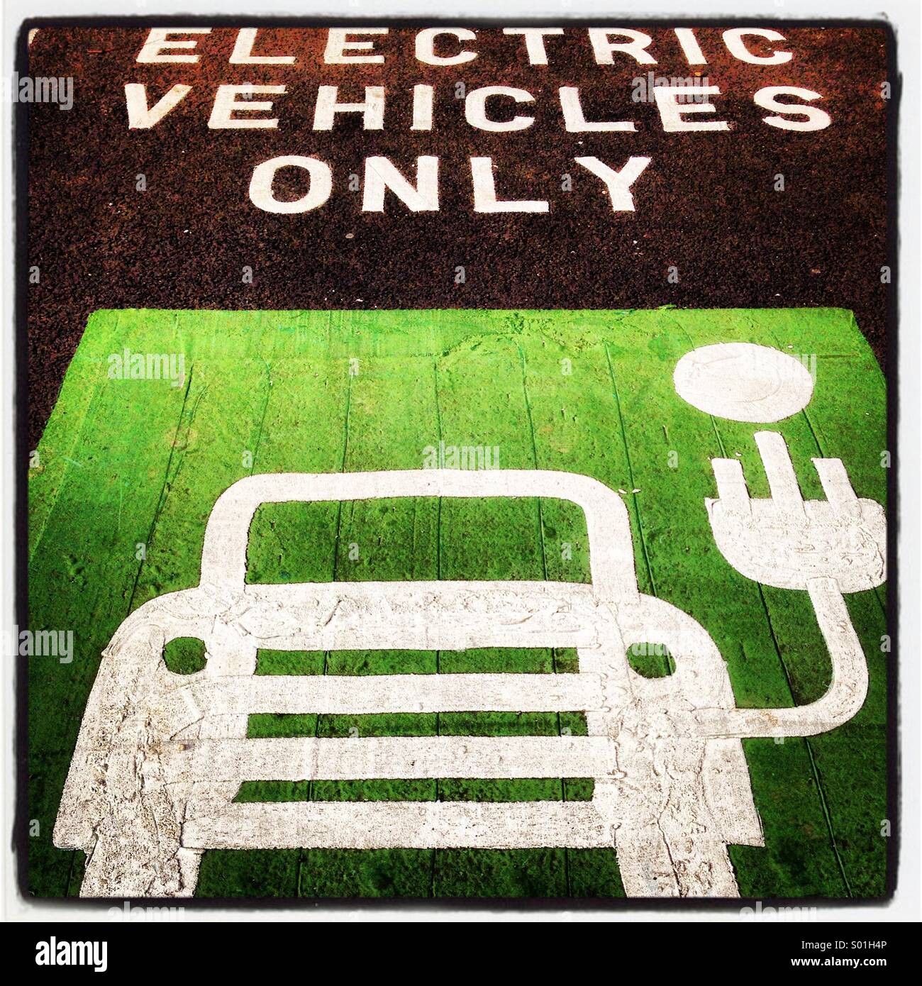 Parking space and recharging point for electric vehicles. Stock Photo