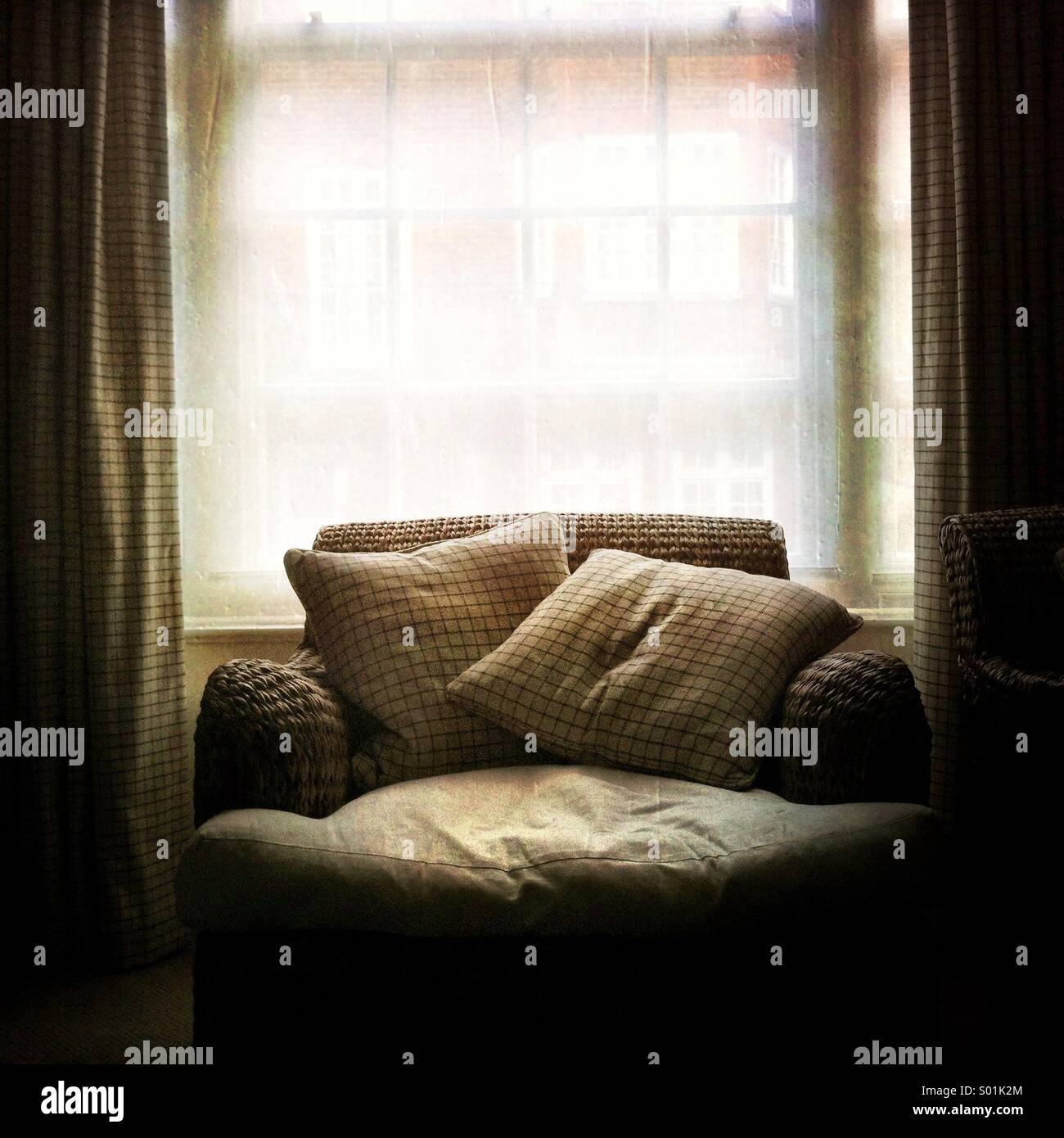 A chair and a window Stock Photo Alamy