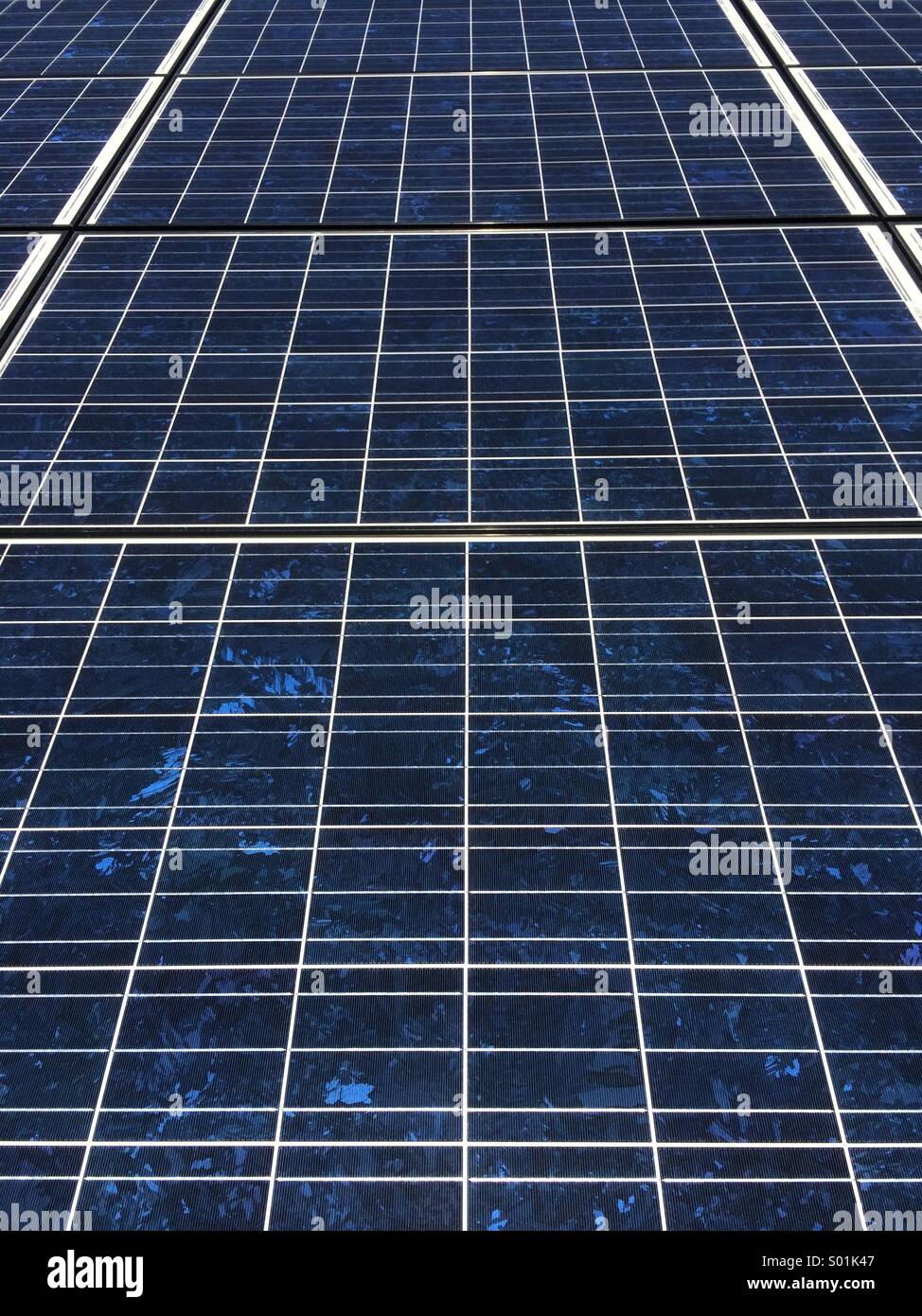 Close up detail of a blue solar panel array, in Connecticut, USA. - Smartphone Captured Stock Image