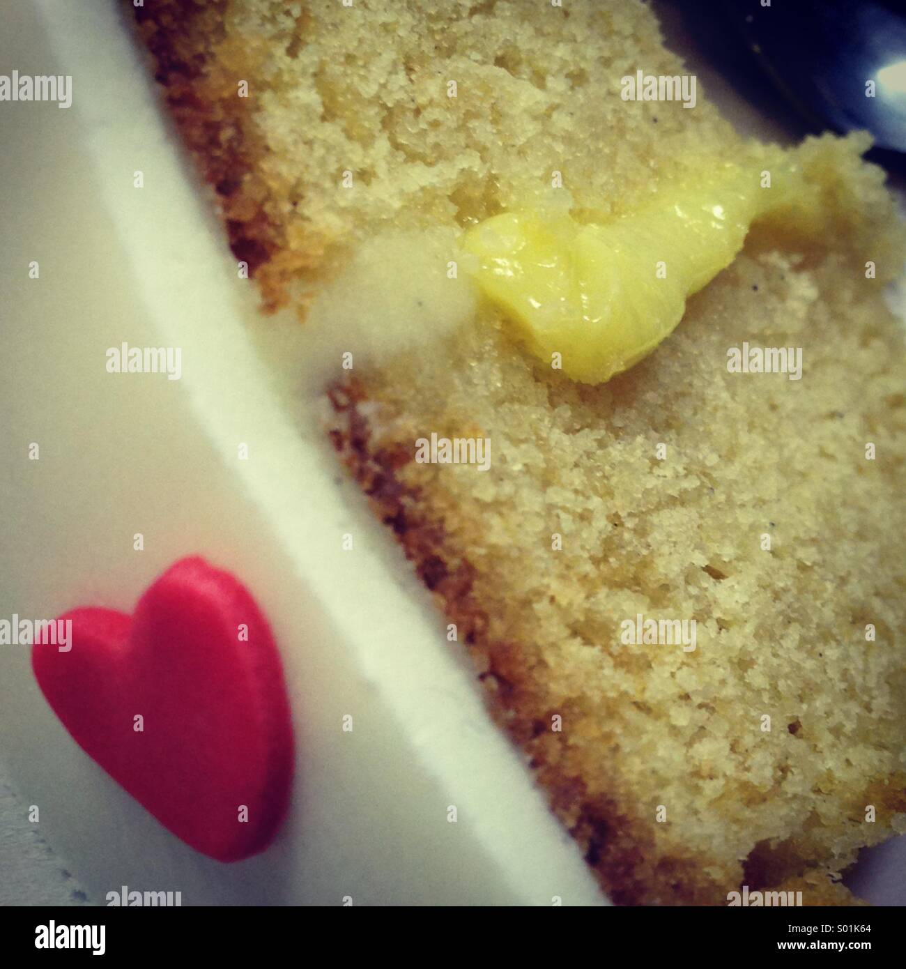 Close fondant cake decorated with funny hearts - Smartphone Captured Stock Image