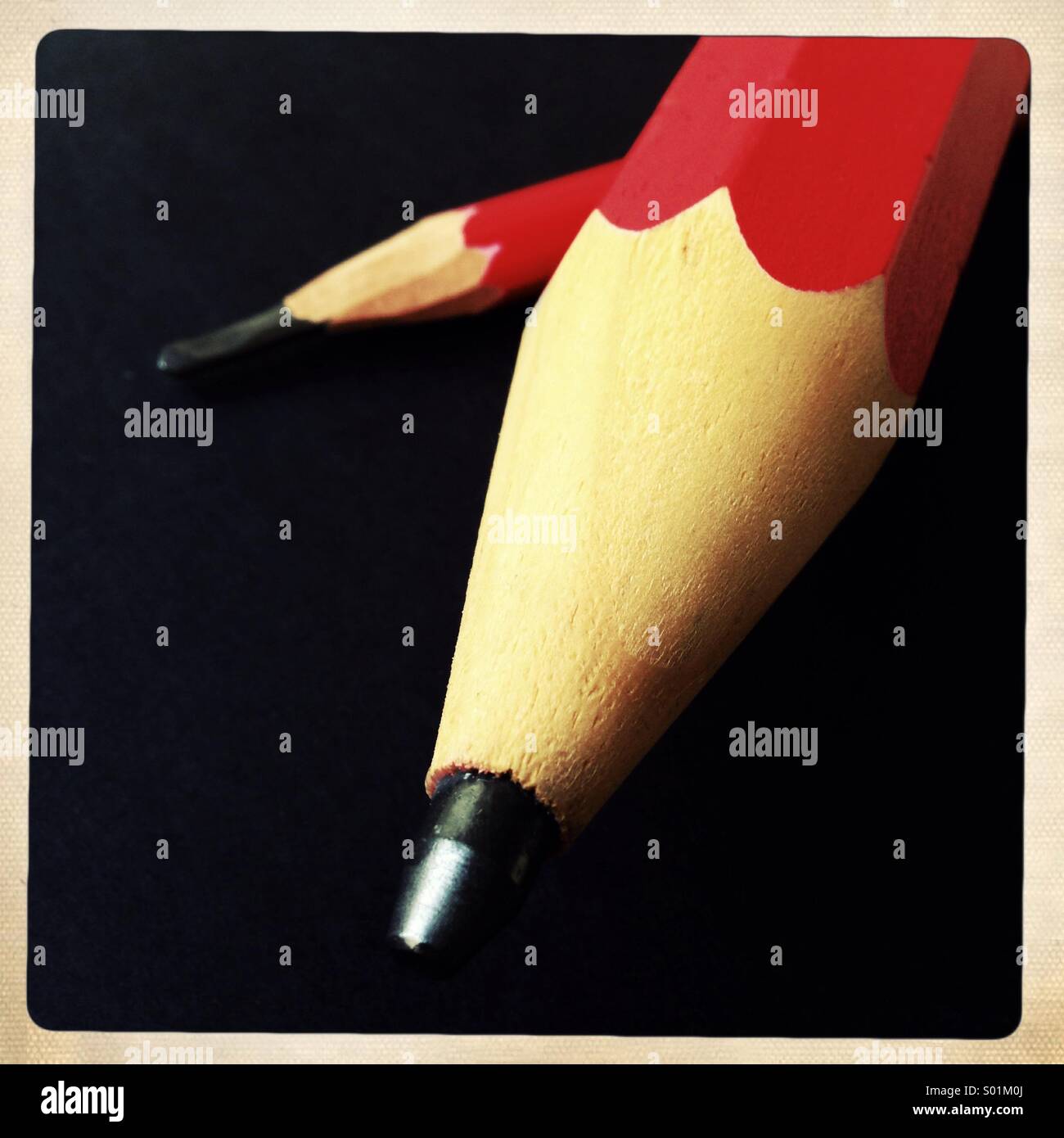 Big pencil, small pencil hi-res stock photography and images - Alamy