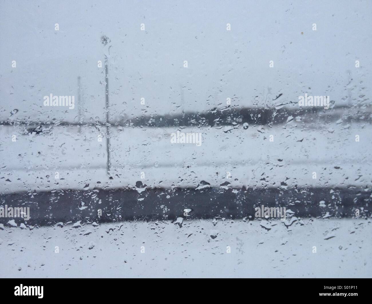 Raindrops at window in Iceland - Smartphone Captured Stock Image