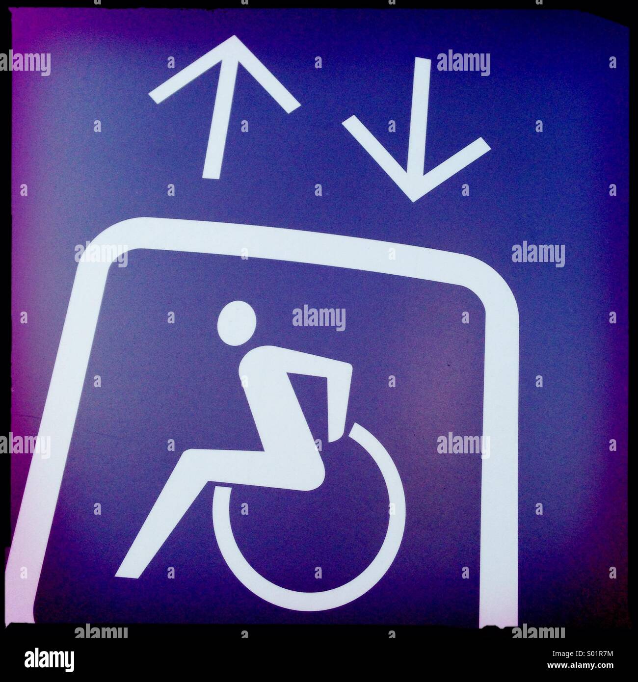 disabled icon on wall - Smartphone Captured Stock Image