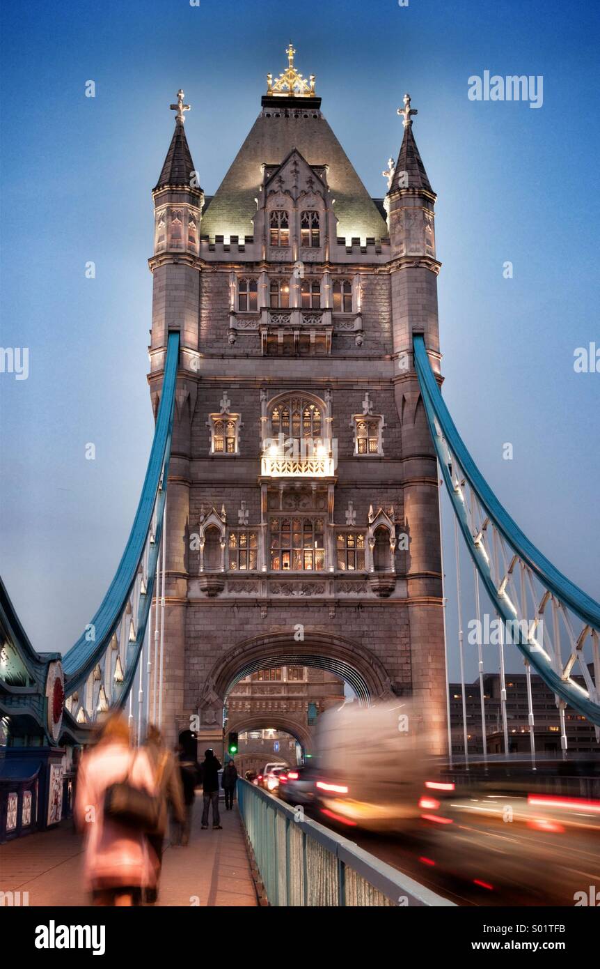 Tower Bridge, London, in the twilight with commuters, tourists and motion blur - Smartphone Captured Stock Image