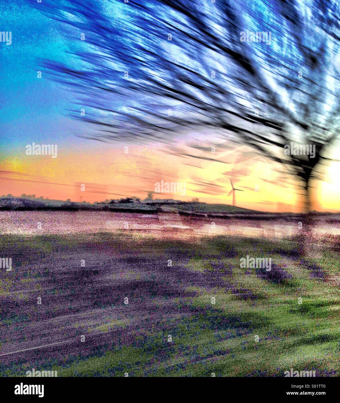 Wind turbine from moving car - Smartphone Captured Stock Image