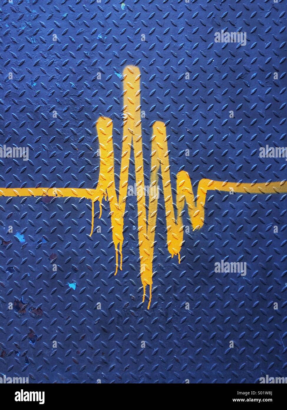 EKG street art. Graffiti of electrocardiography waves (aka ECG) on blue metal surface in Manhattan, New York City, USA. Stock Photo