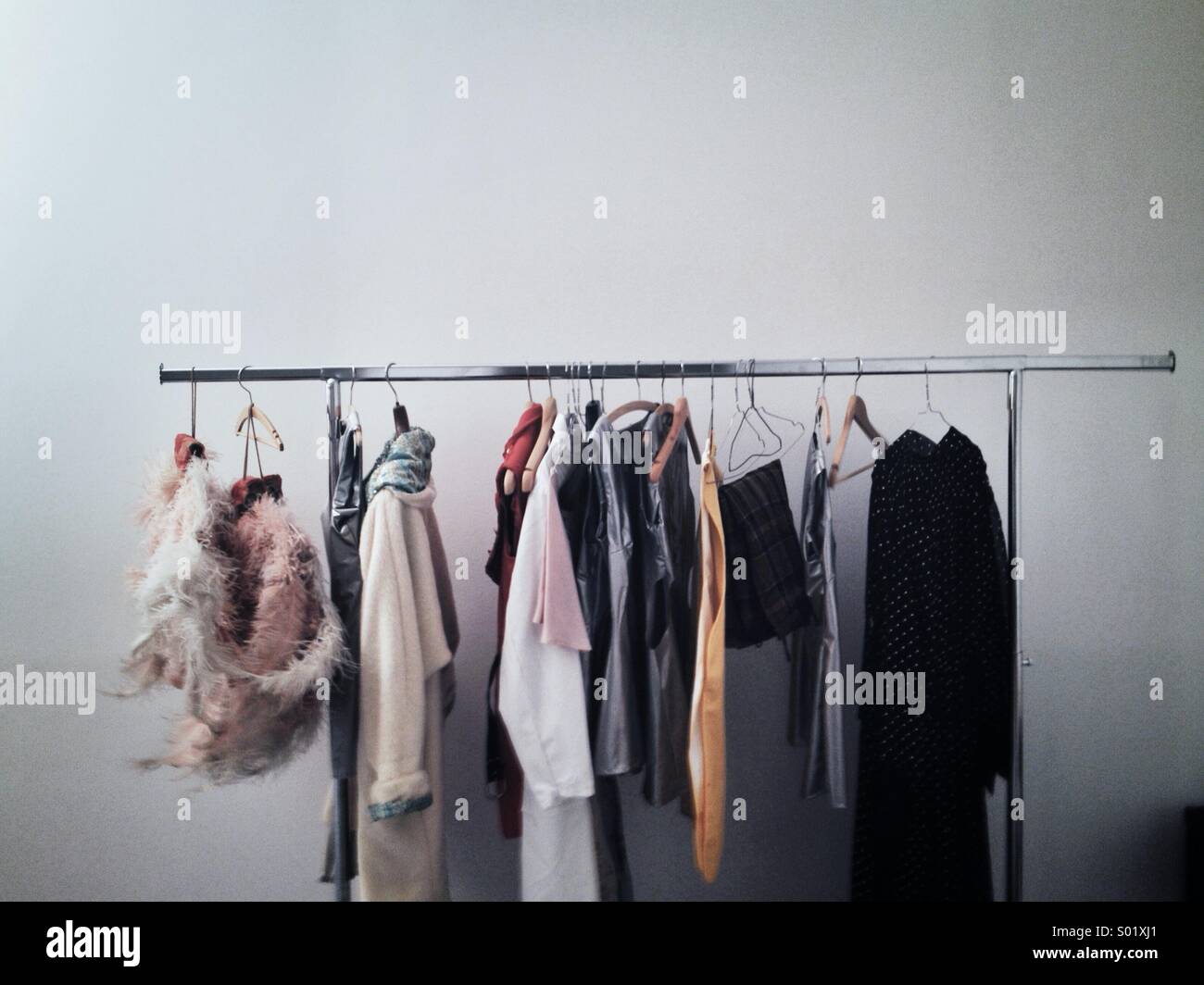 Clothes in theatre on rack Stock Photo - Alamy