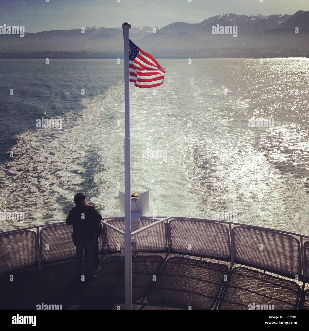 Ferry 'Coho' crosses Straits of Juan de Fuca between Washington State and Victoria BC, Canada - Smartphone Captured Stock Image
