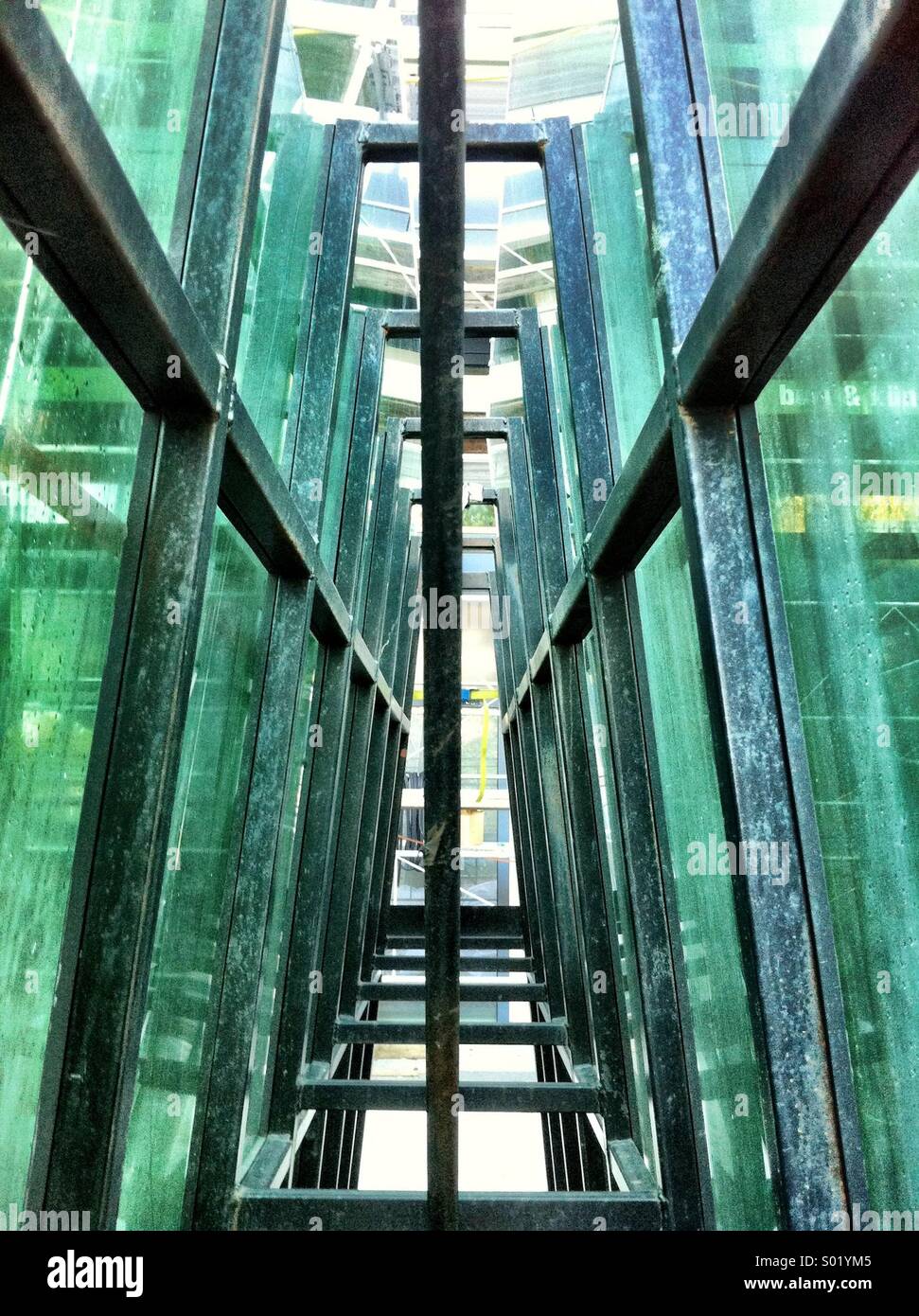 New glass panes await installation during a building refurbishment - Smartphone Captured Stock Image