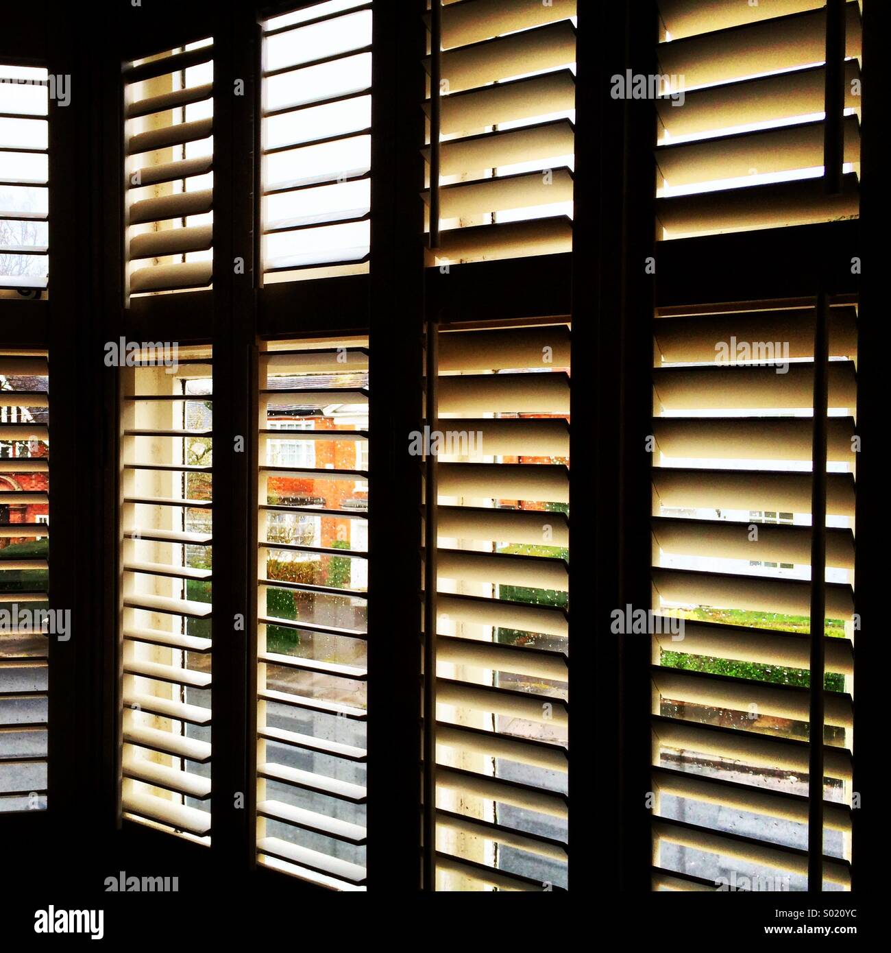 Open window shutters at an angle. Stock Photo