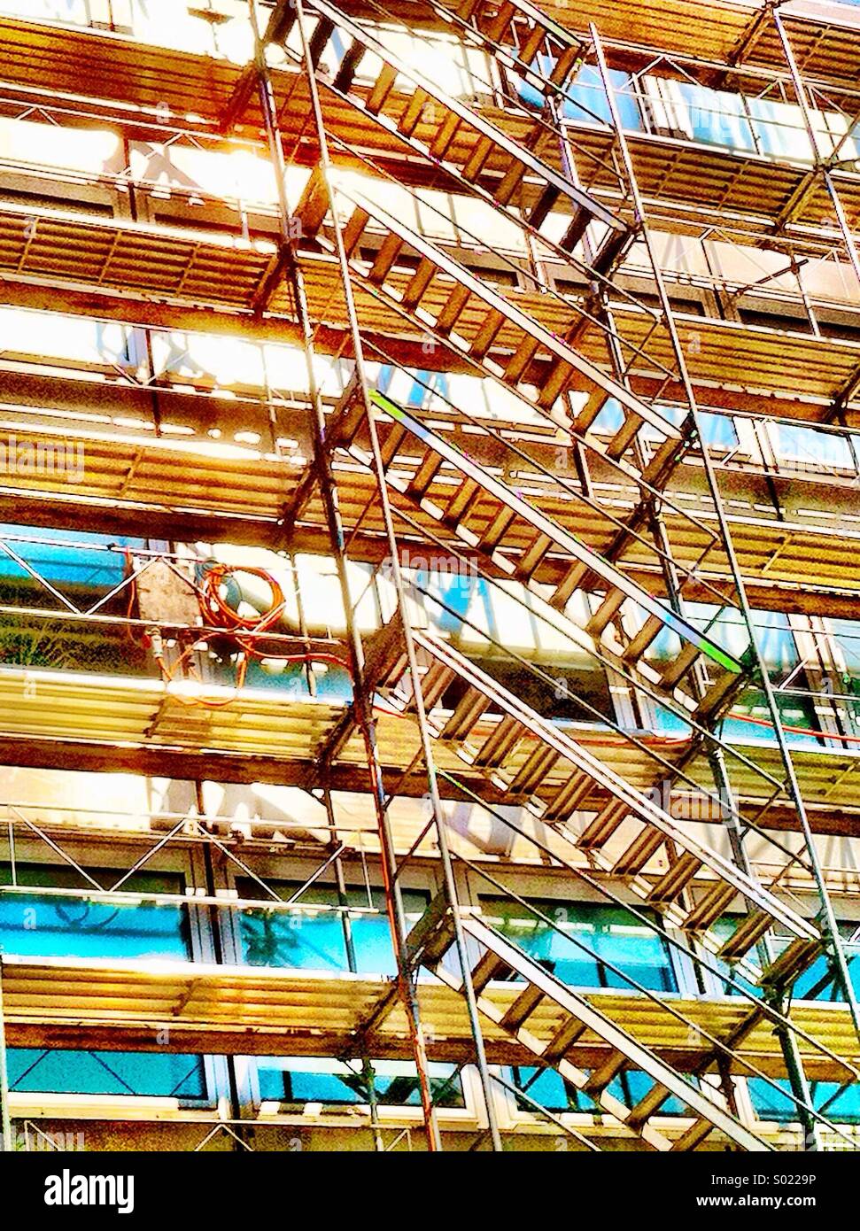 Building undergoing renovation with scaffolding - Smartphone Captured Stock Image