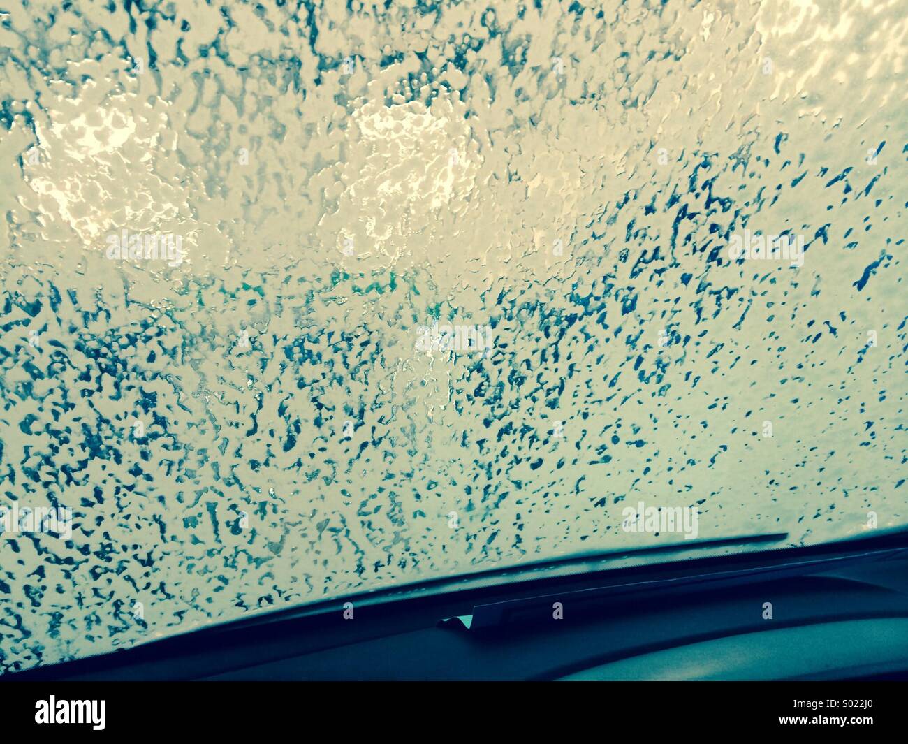 Going through the car wash - foam on the windscreen - Smartphone Captured Stock Image