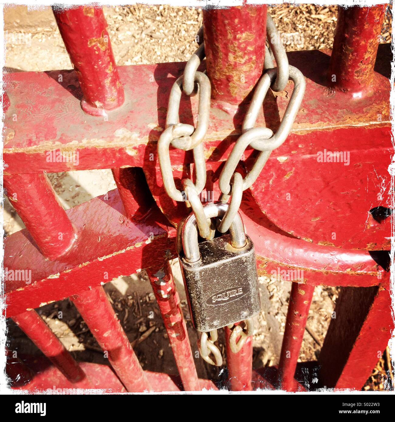 Lock and chains on a set of gates - Smartphone Captured Stock Image