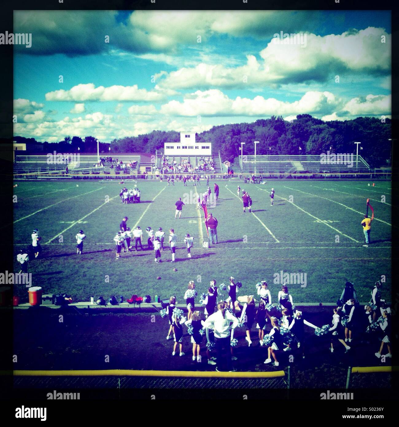 Cloud filled sky at a youth football game. - Smartphone Captured Stock Image
