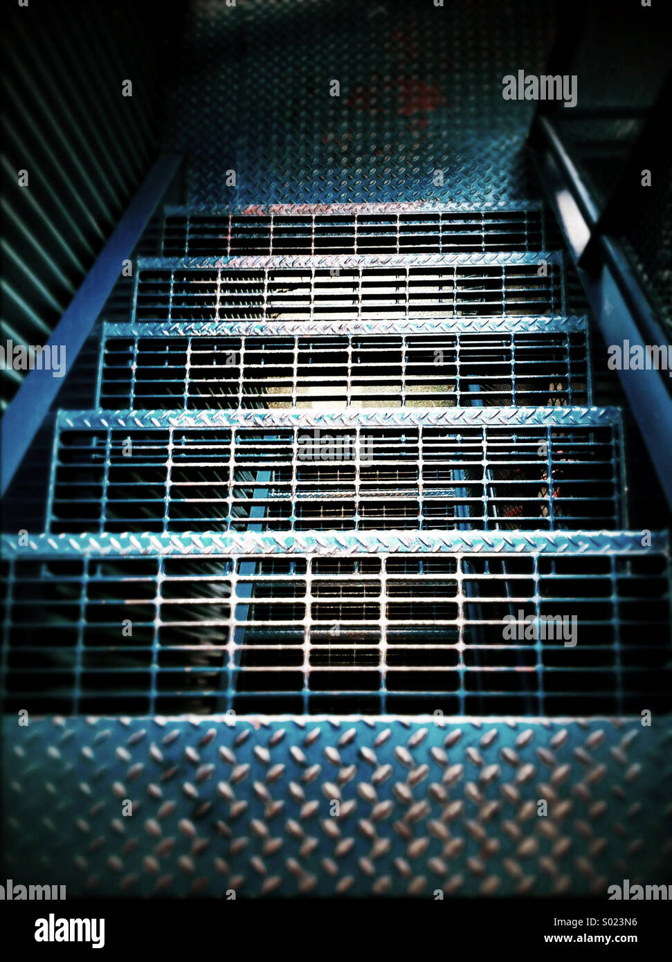 Looking down an industrial metal stairwell. - Smartphone Captured Stock Image