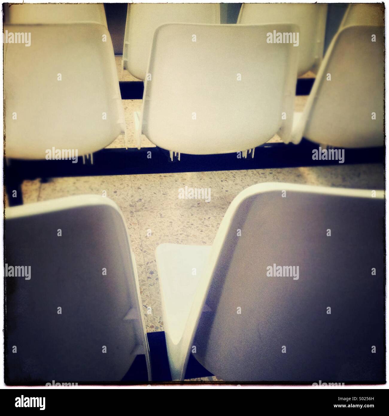 Empty chairs in a waiting room of a public hospital in Barcelona, Catalonia, Spain - Smartphone Captured Stock Image