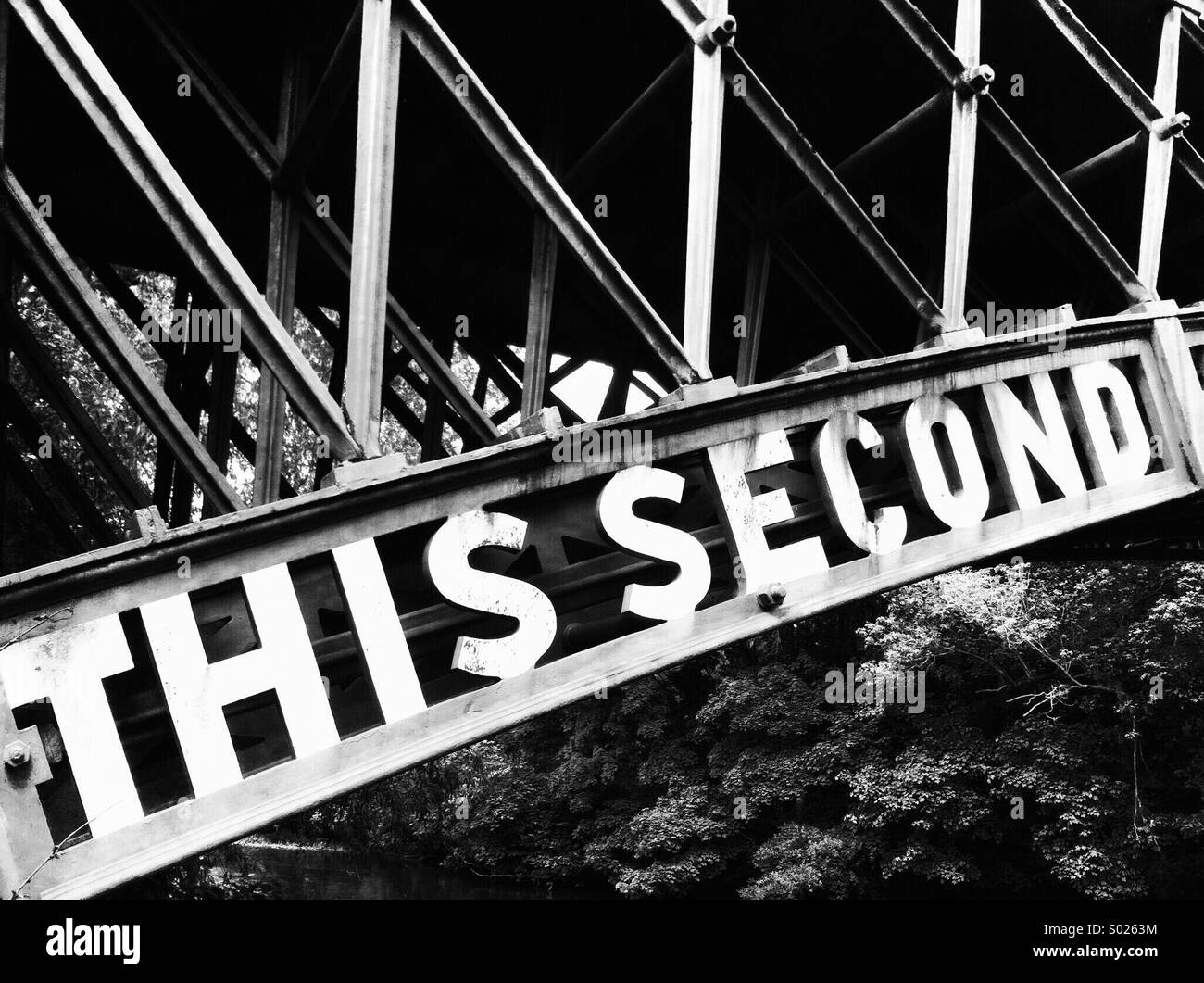 Bridge with 'this second' logo (black & white) Stock Photo