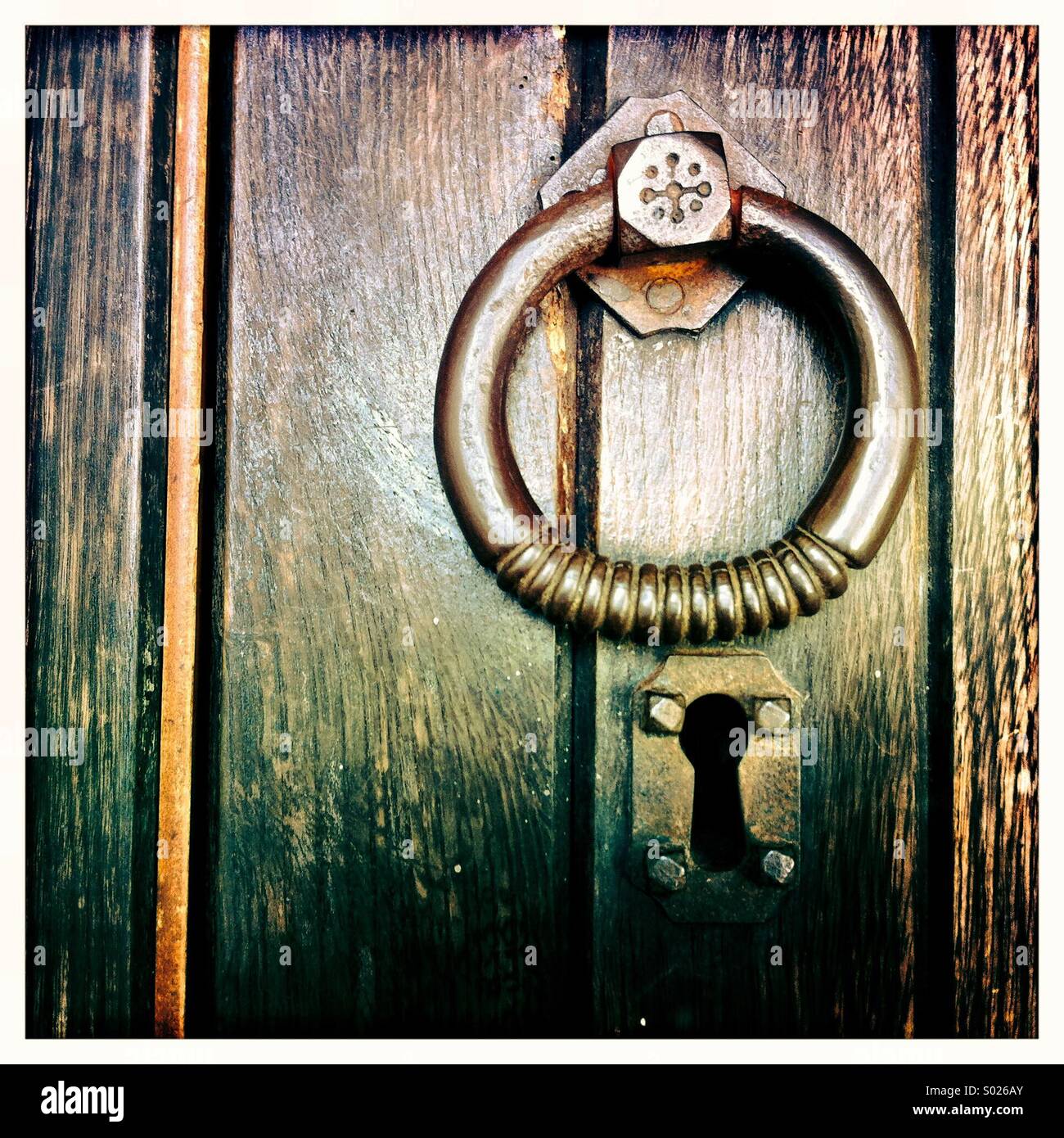 Door knocker on church door Stock Photo