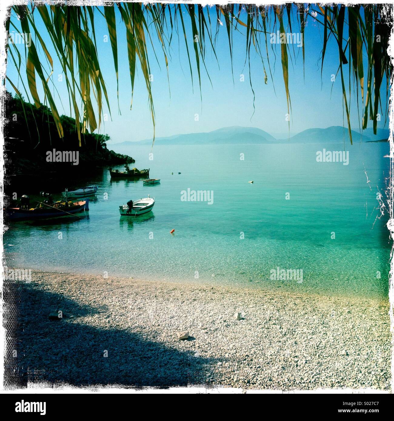 Beach and fishing boats, Vassiliki, Lefkada, Greece Stock Photo