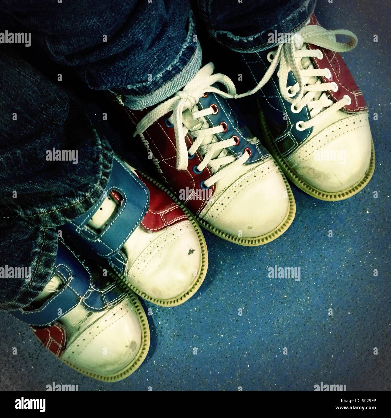 Tenpin bowling shoes adult and child Stock Photo Alamy